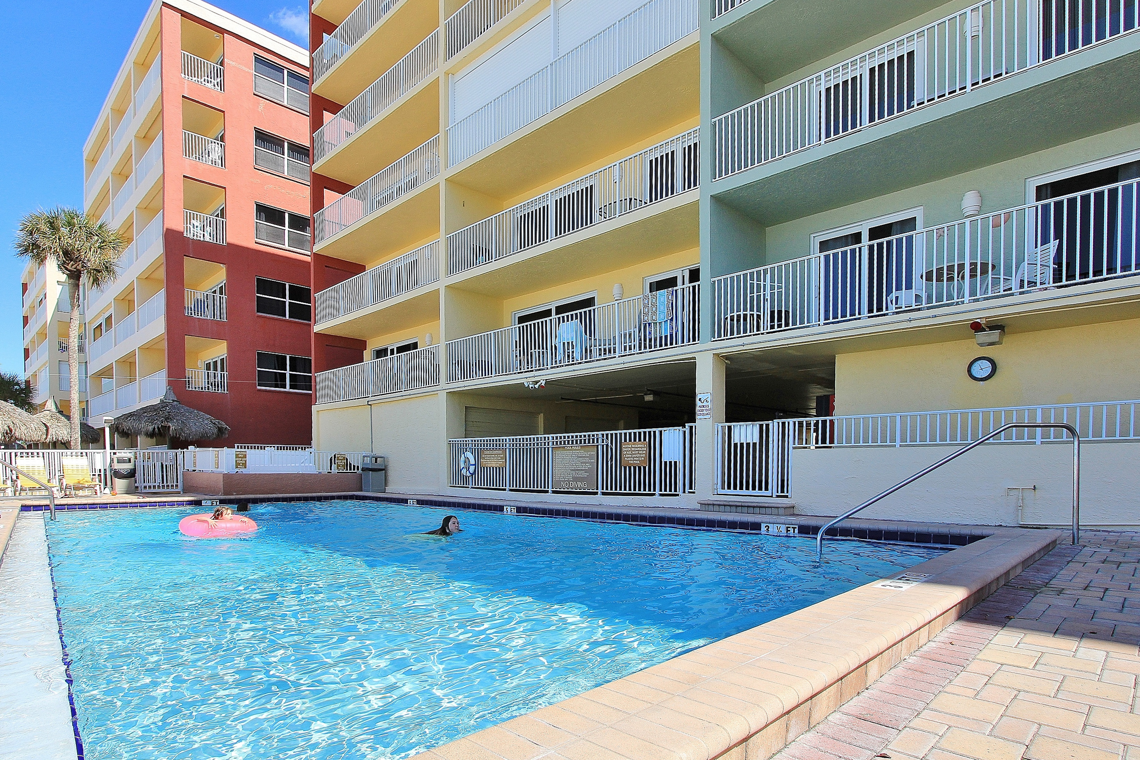 Oceanfront condo with heated pool hot tub and grills