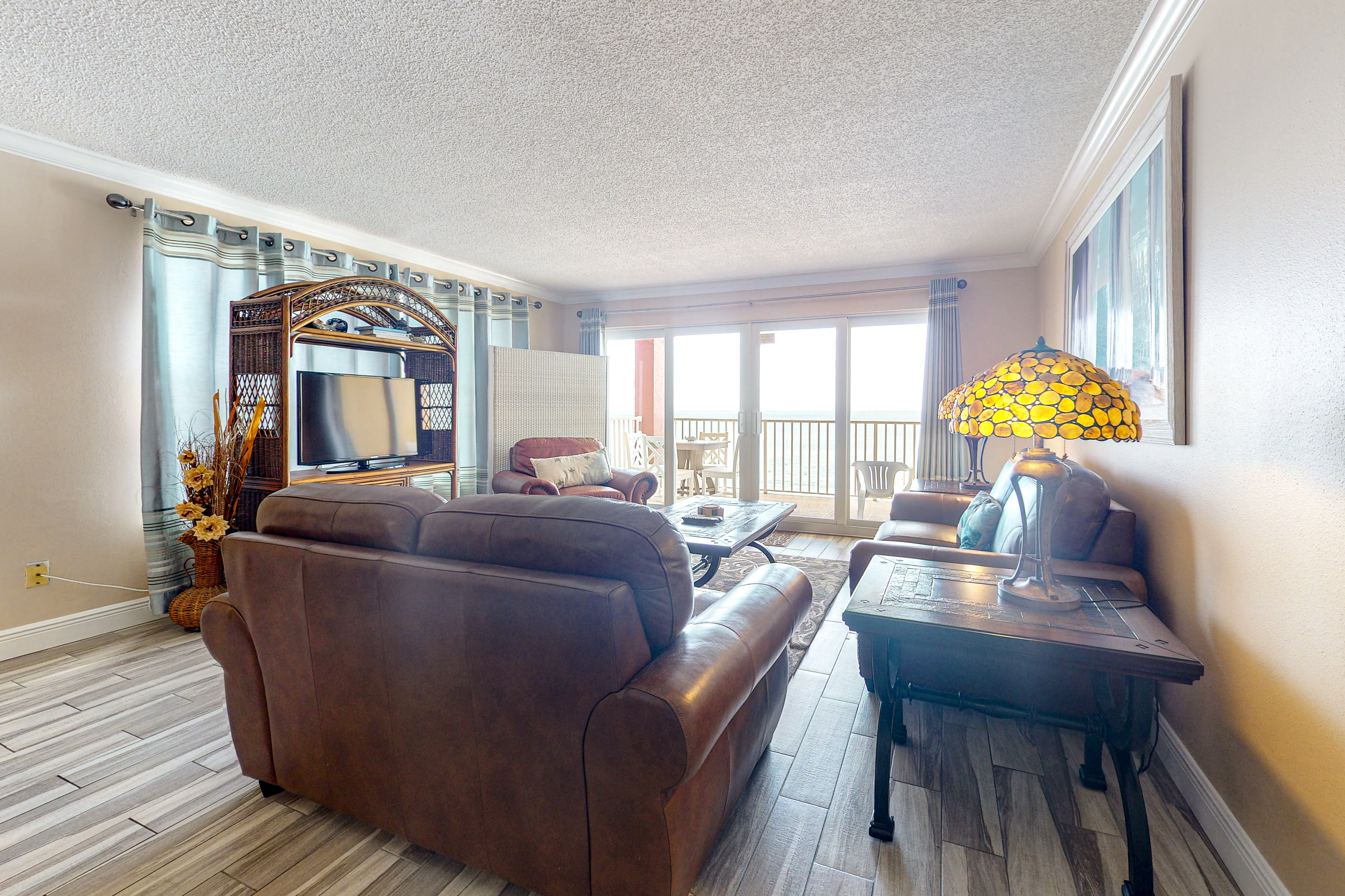 Beachfront condo with heated pool hot tub balcony and grill