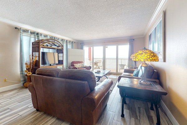 Beachfront condo with heated pool hot tub balcony and grill