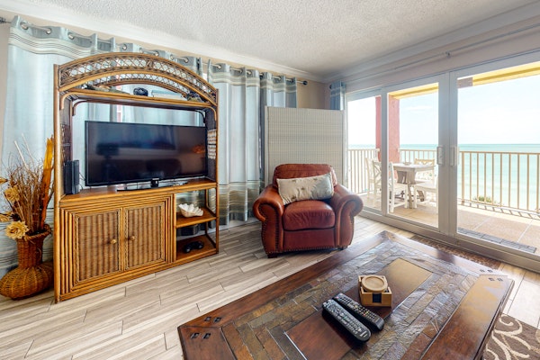 Beachfront condo with heated pool hot tub balcony and grill