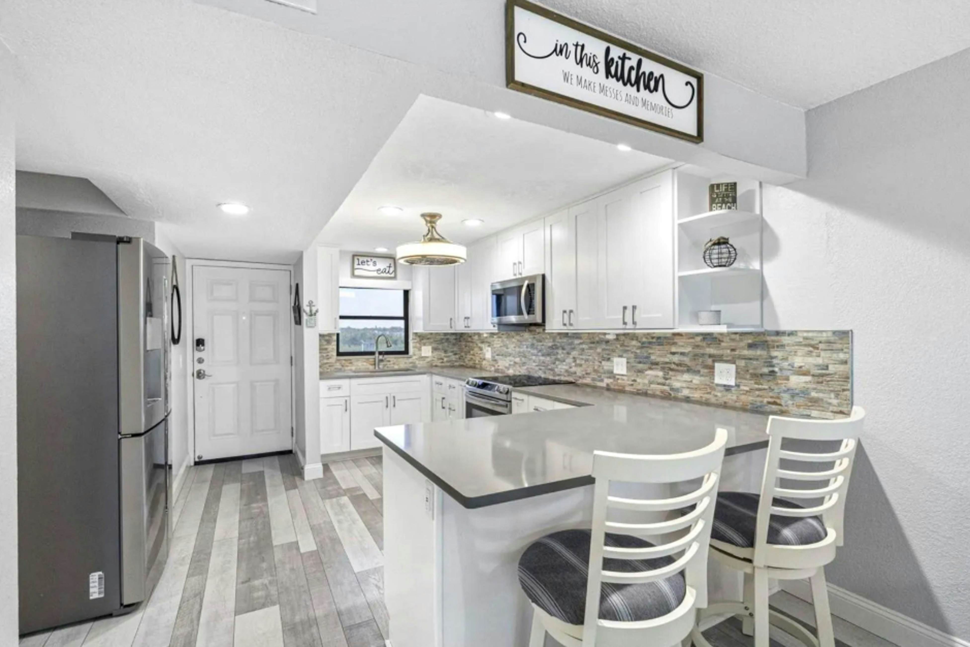 Modern and Gulf front direct beach access pool snowbird family and dog friendly