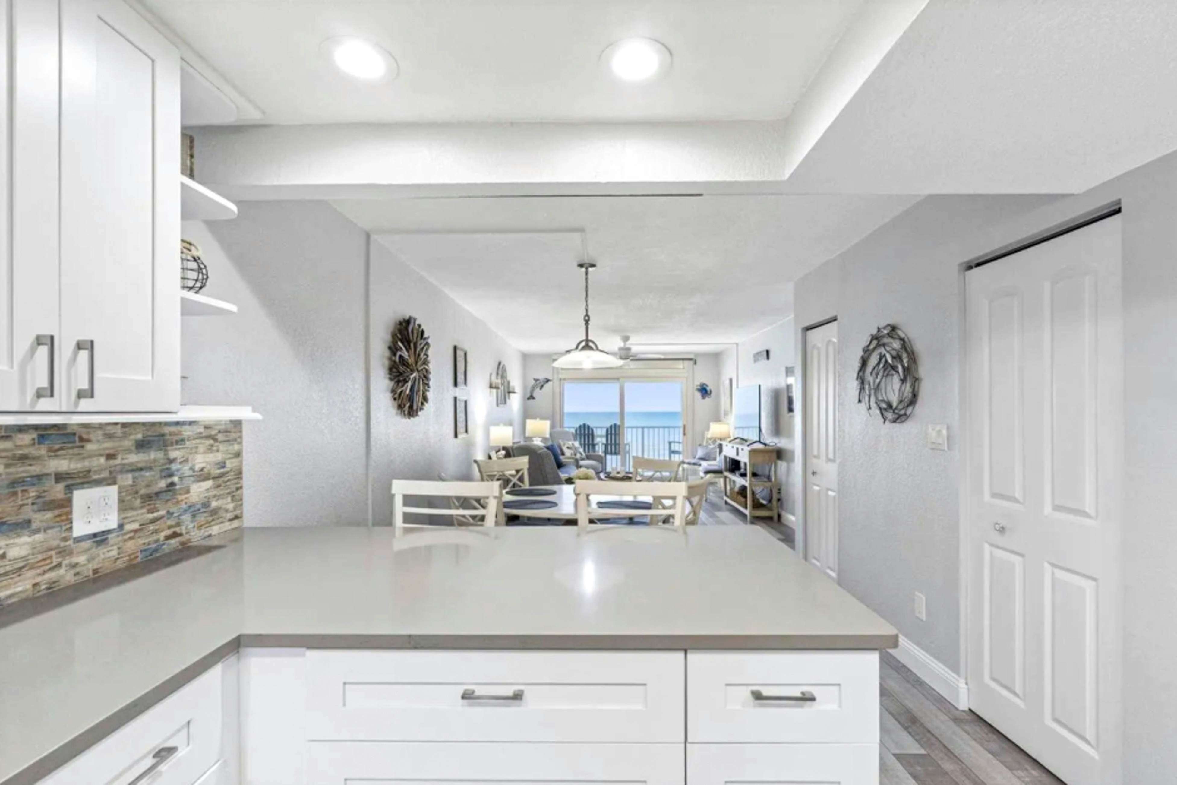 Modern and Gulf front direct beach access pool snowbird family and dog friendly