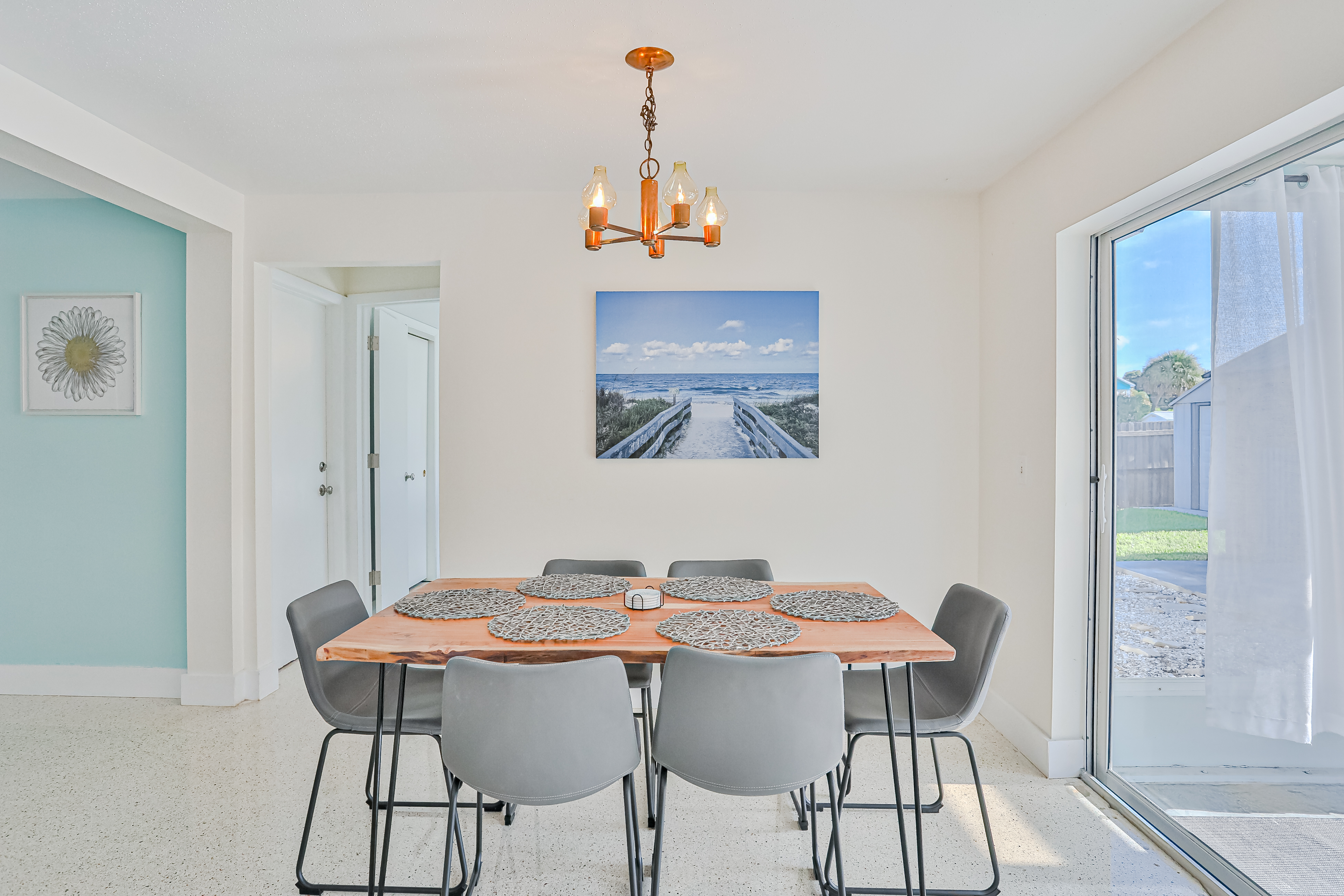 Modern coastal getaway with pool enclosed yard grill and outdoor bar