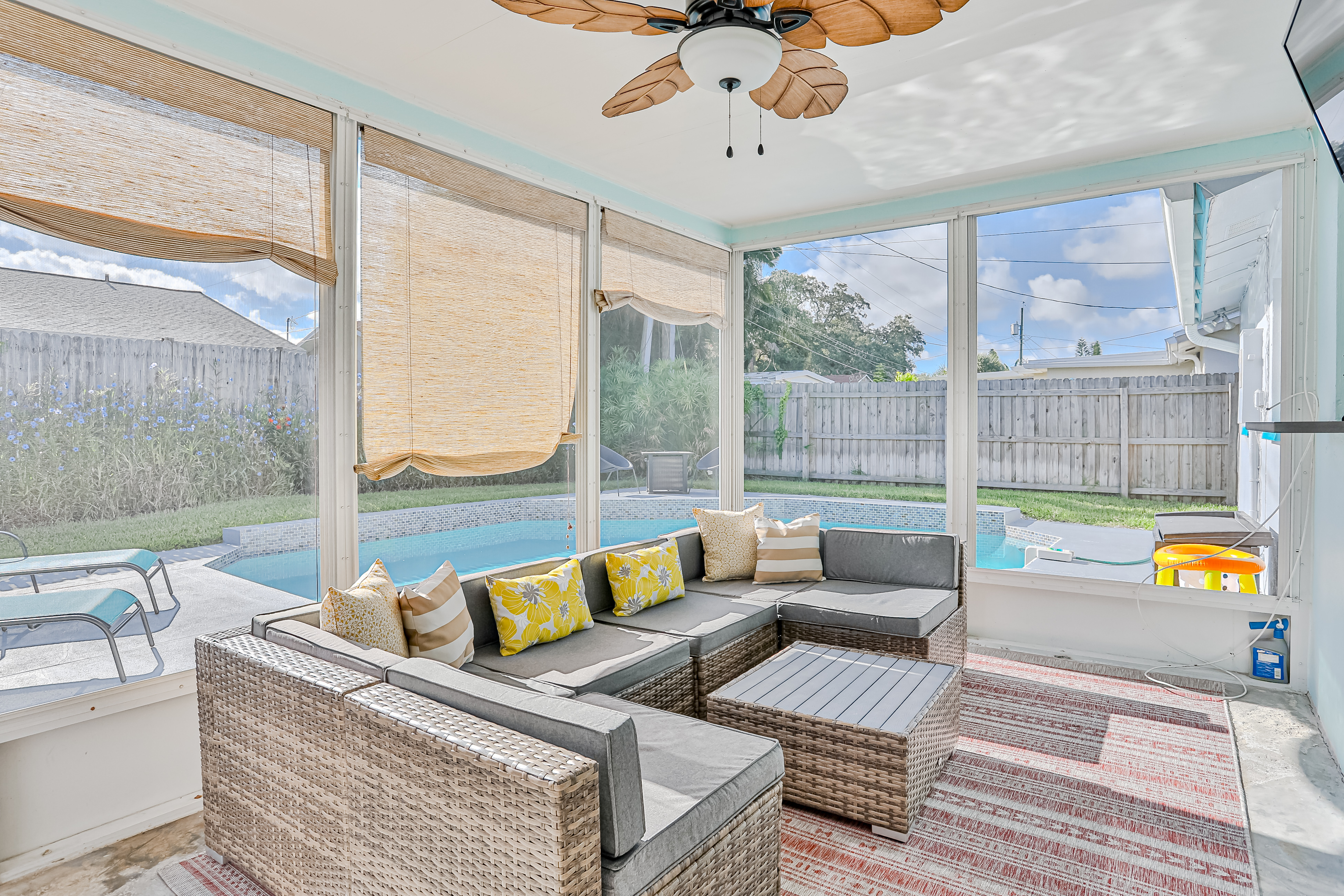 Modern coastal getaway with pool enclosed yard grill and outdoor bar