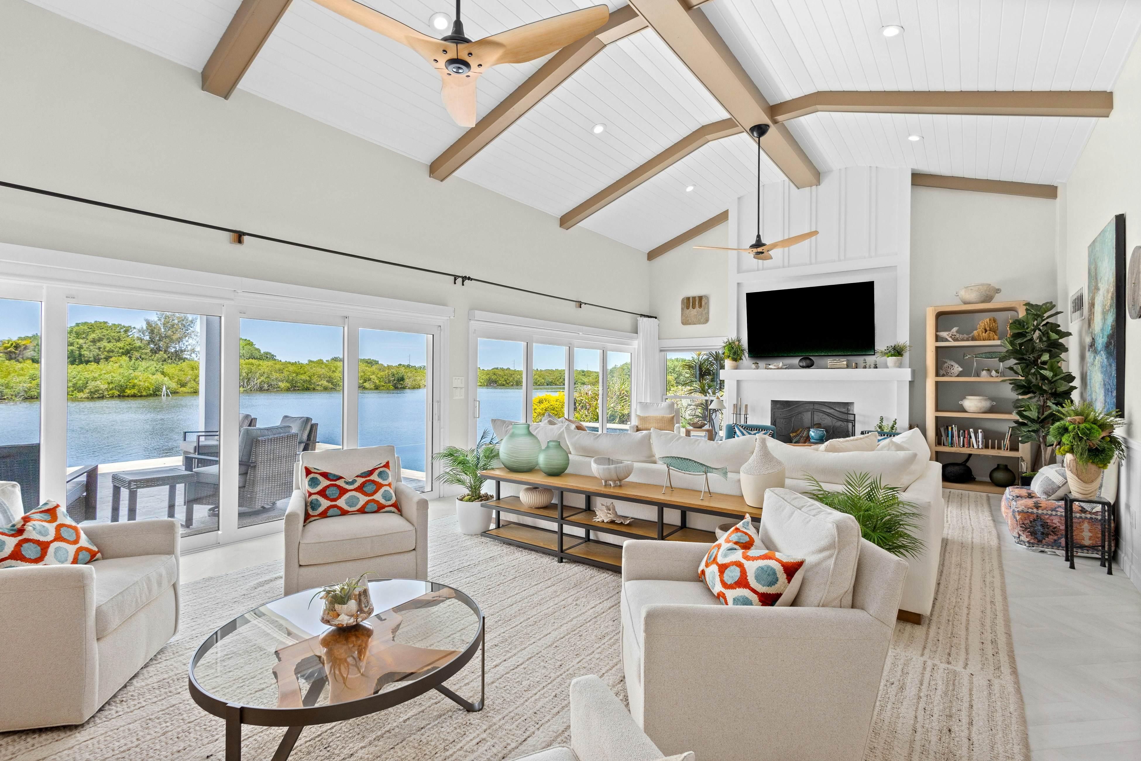 Modern indulgence with media room, expansive waterway views, AC, WD and Wifi