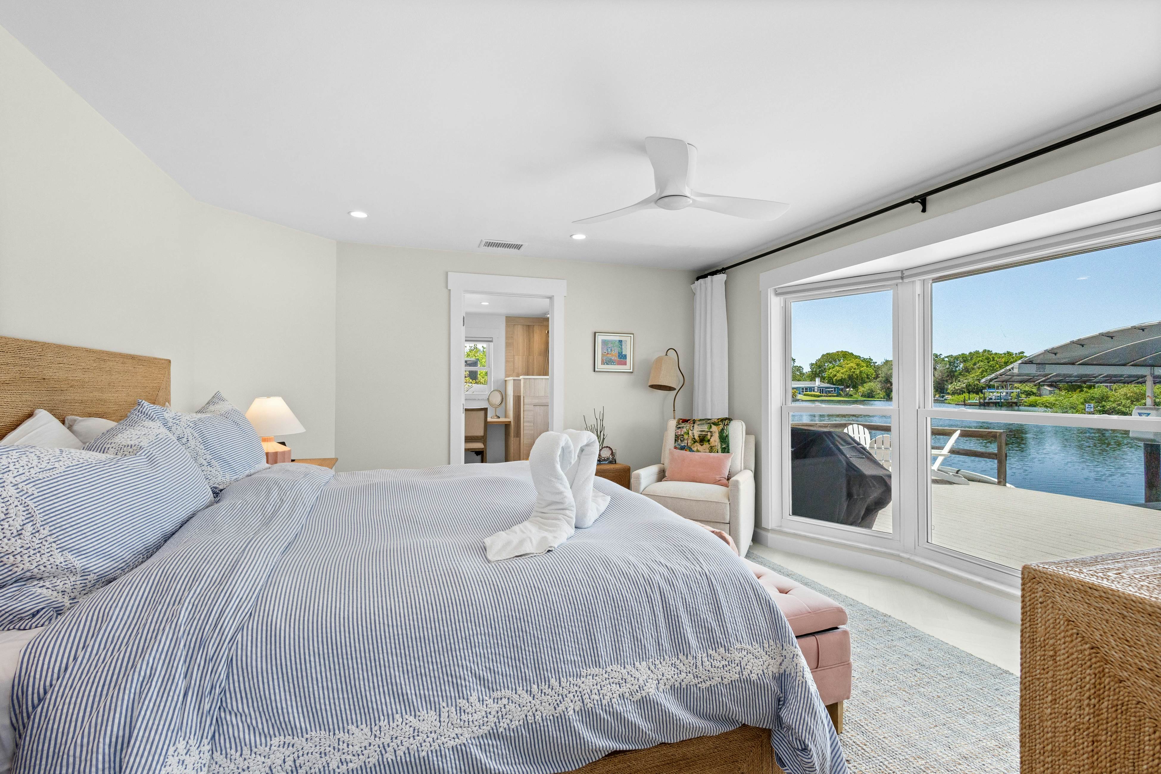 Modern indulgence with media room, expansive waterway views, AC, WD and Wifi