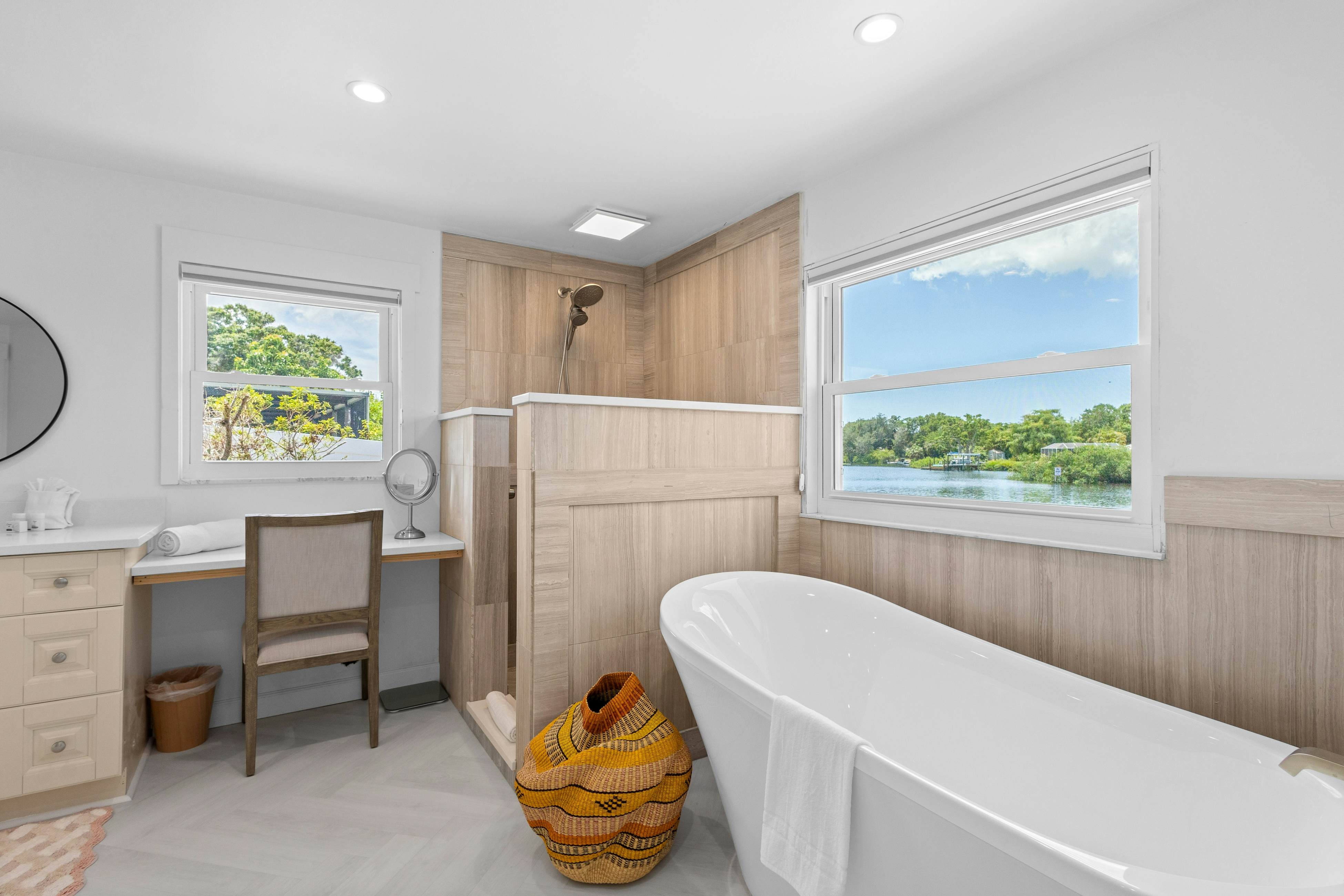 Modern indulgence with media room, expansive waterway views, AC, WD and Wifi