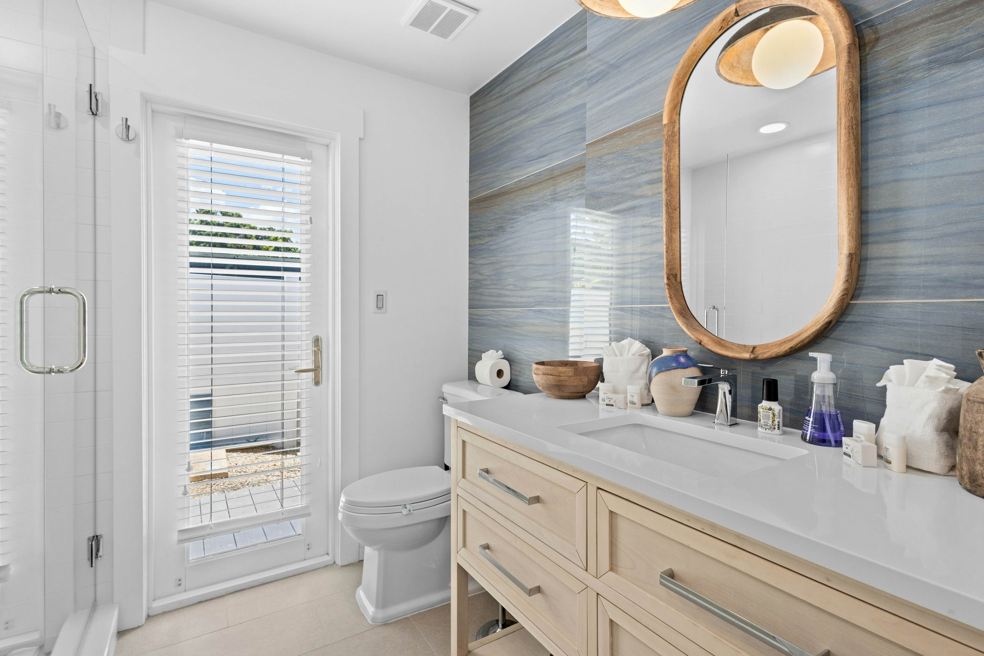 Modern indulgence with media room, expansive waterway views, AC, WD and Wifi