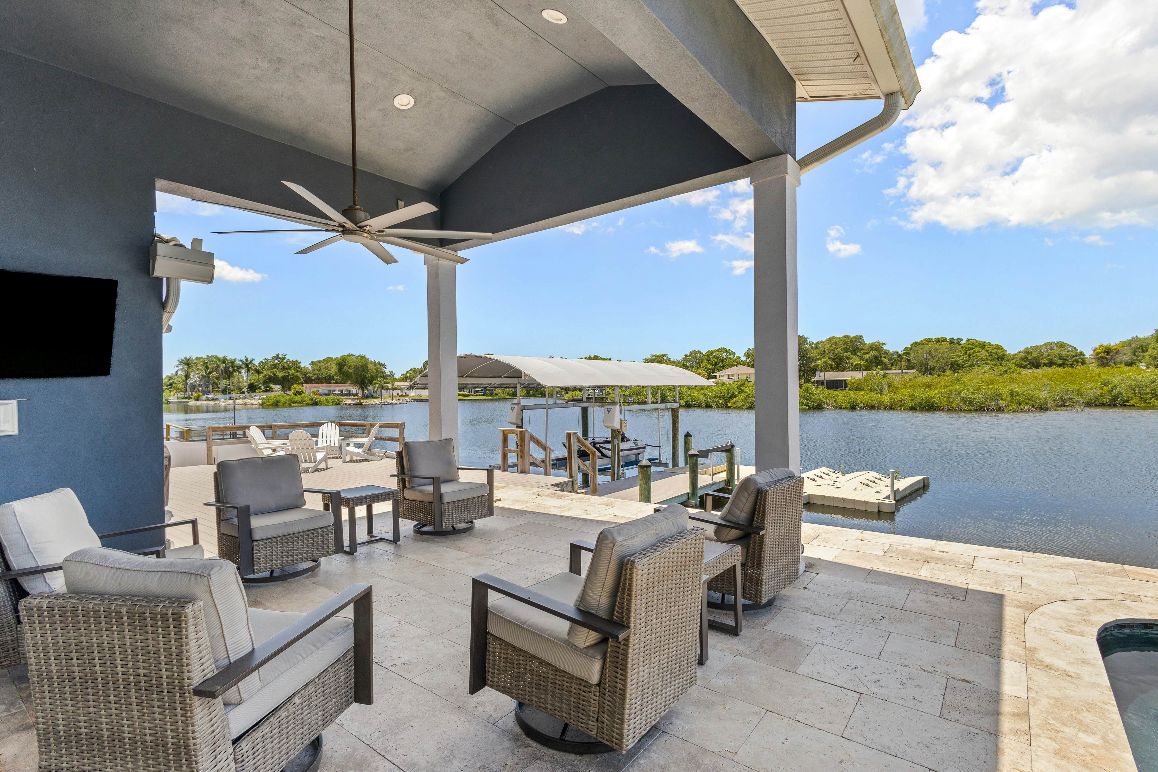 Modern indulgence with media room, expansive waterway views, AC, WD and Wifi