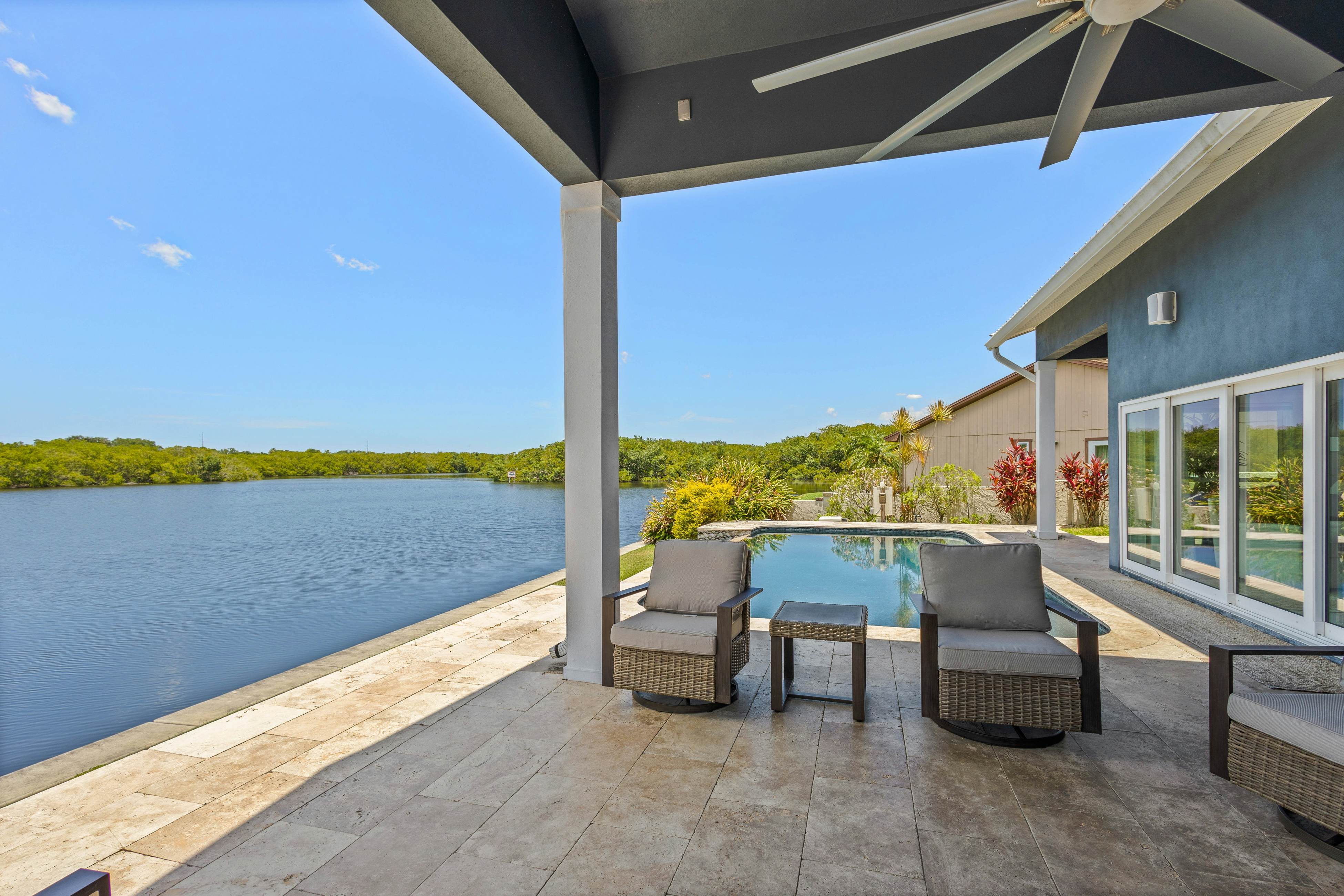 Modern indulgence with media room, expansive waterway views, AC, WD and Wifi