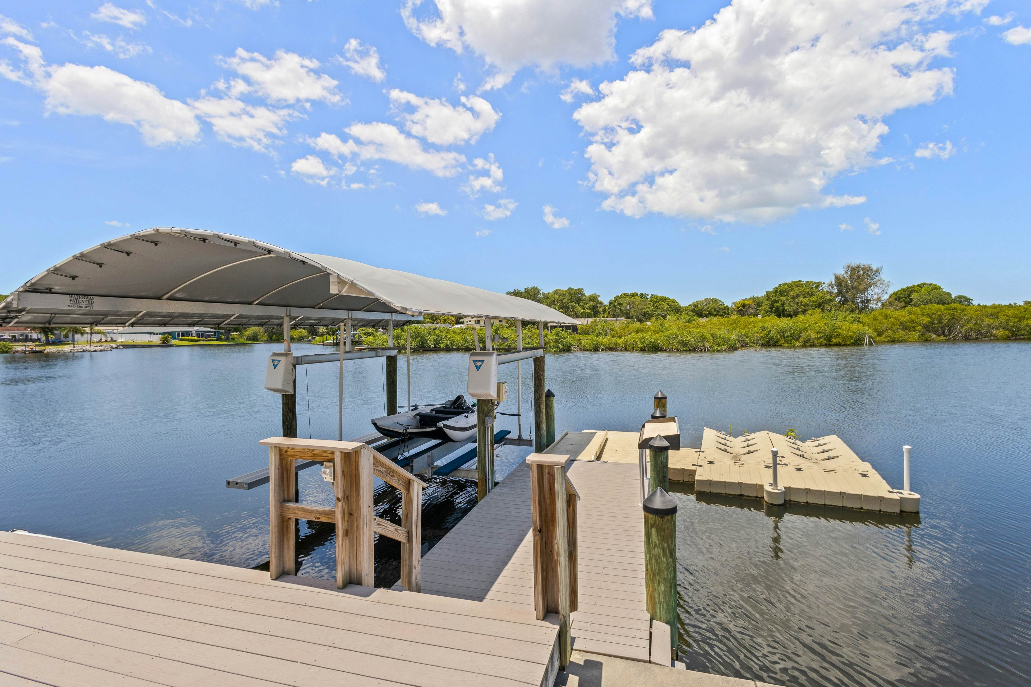 Modern indulgence with media room, expansive waterway views, AC, WD and Wifi