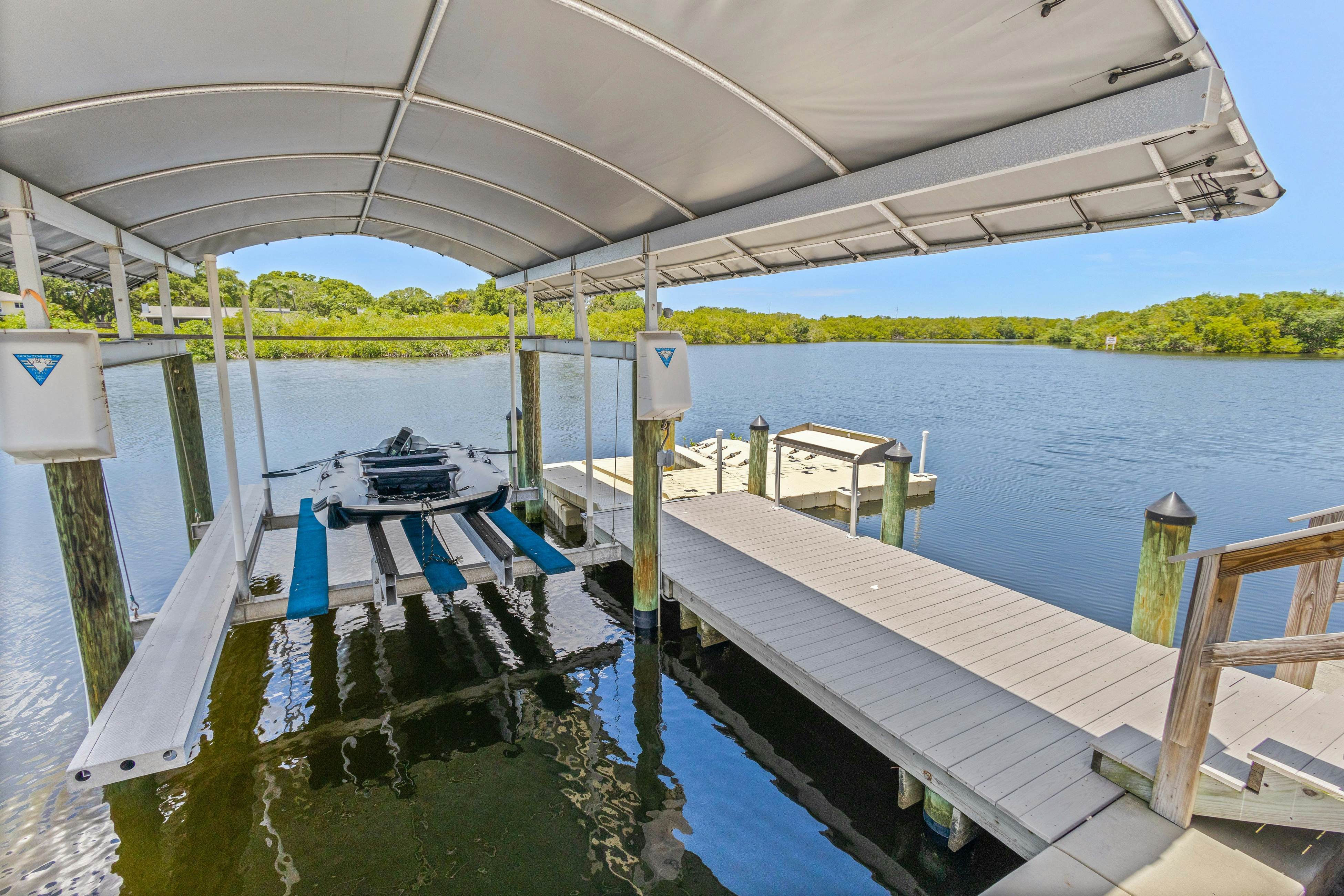 Modern indulgence with media room, expansive waterway views, AC, WD and Wifi