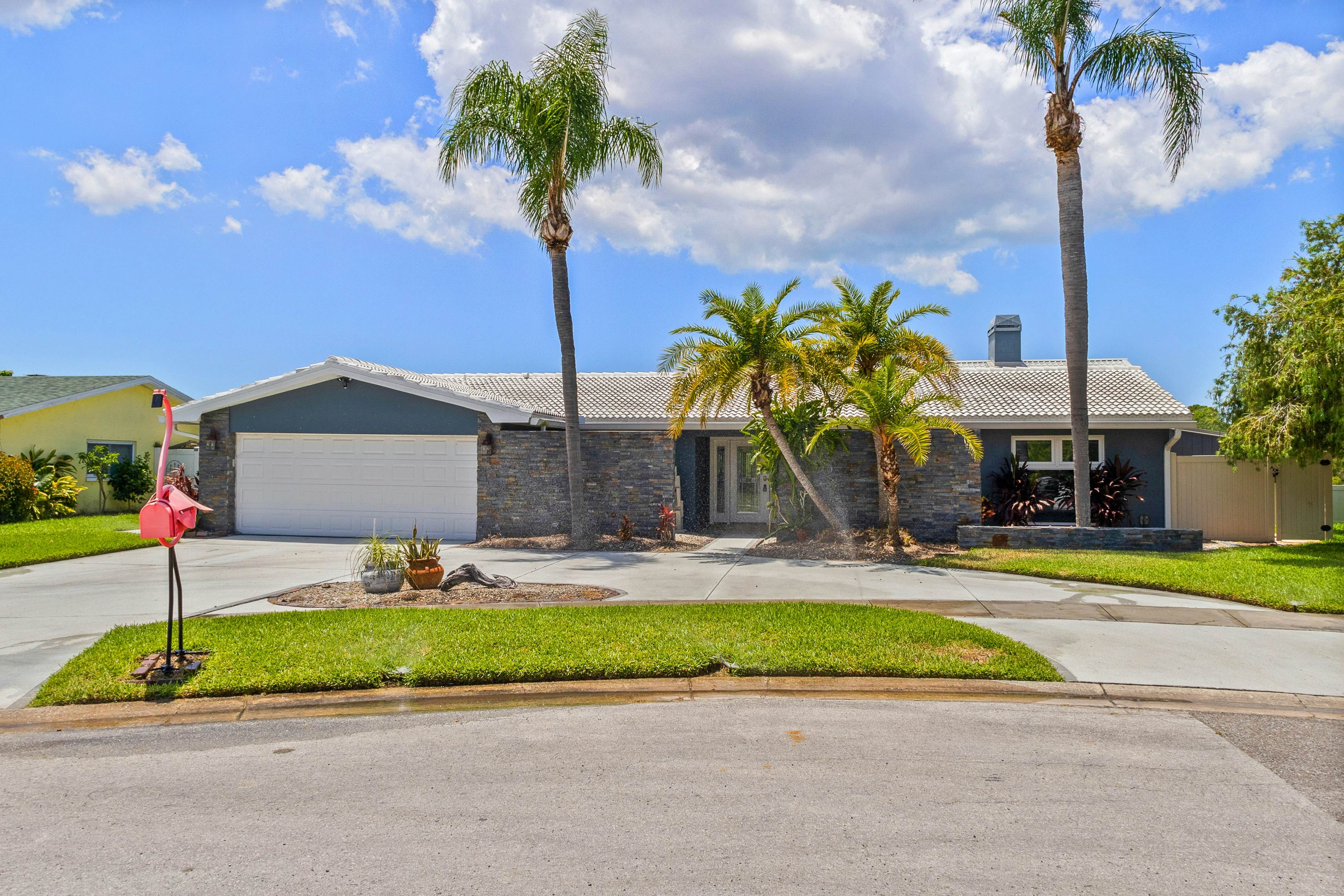 Modern indulgence with media room, expansive waterway views, AC, WD and Wifi