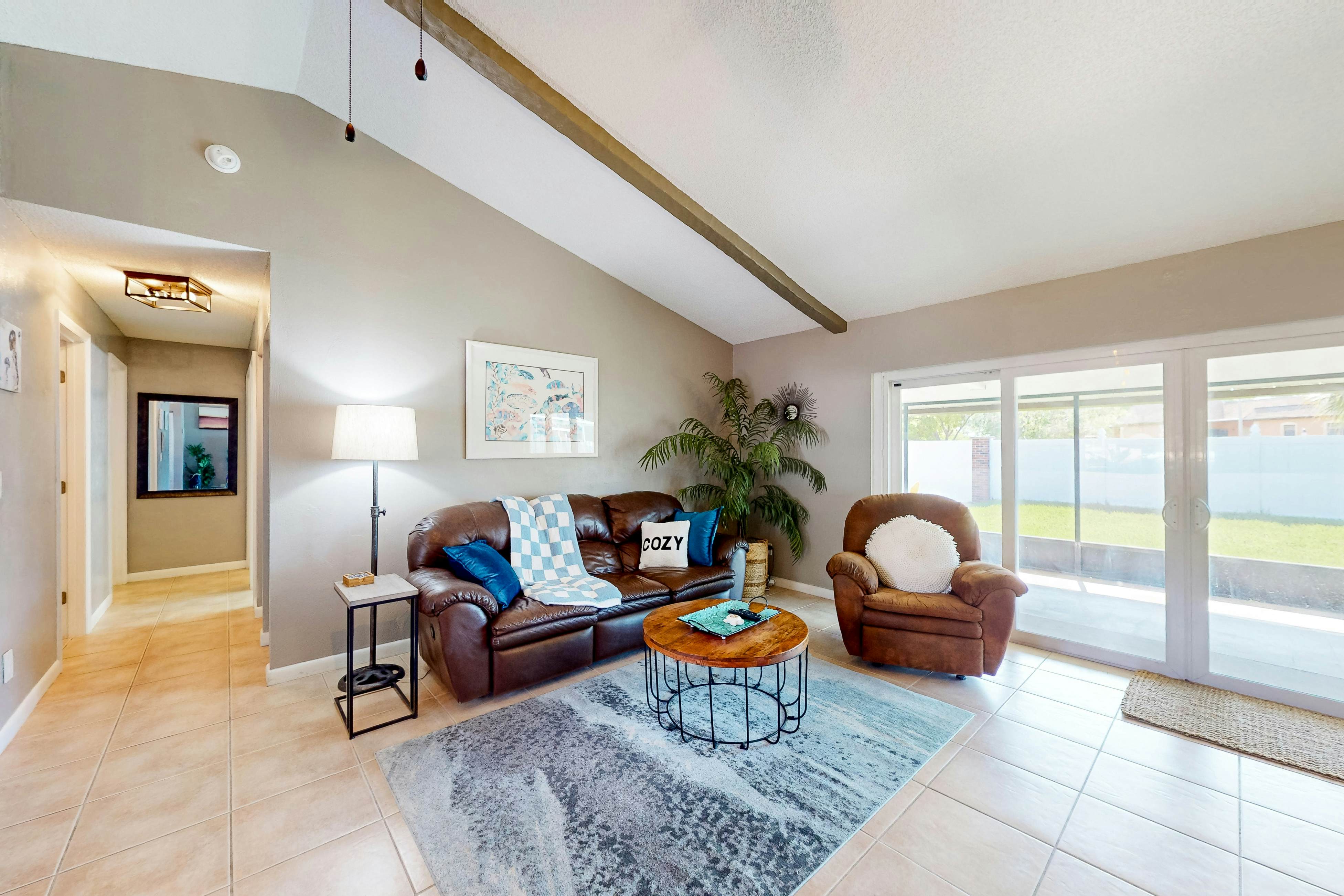 Dog-friendly house with patio, firepit, fenced yard, beach gear, & AC