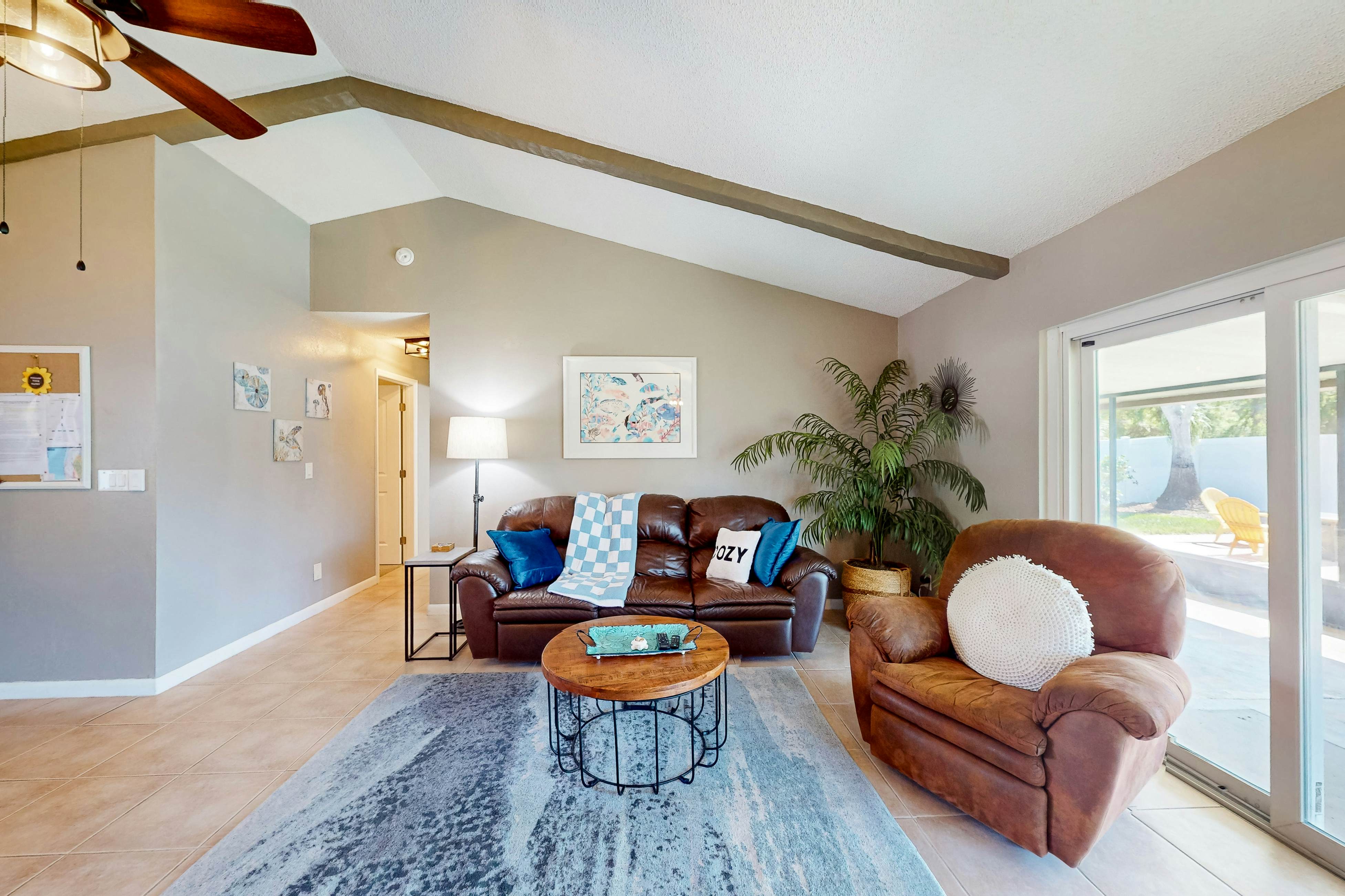 Dog-friendly house with patio, firepit, fenced yard, beach gear, & AC