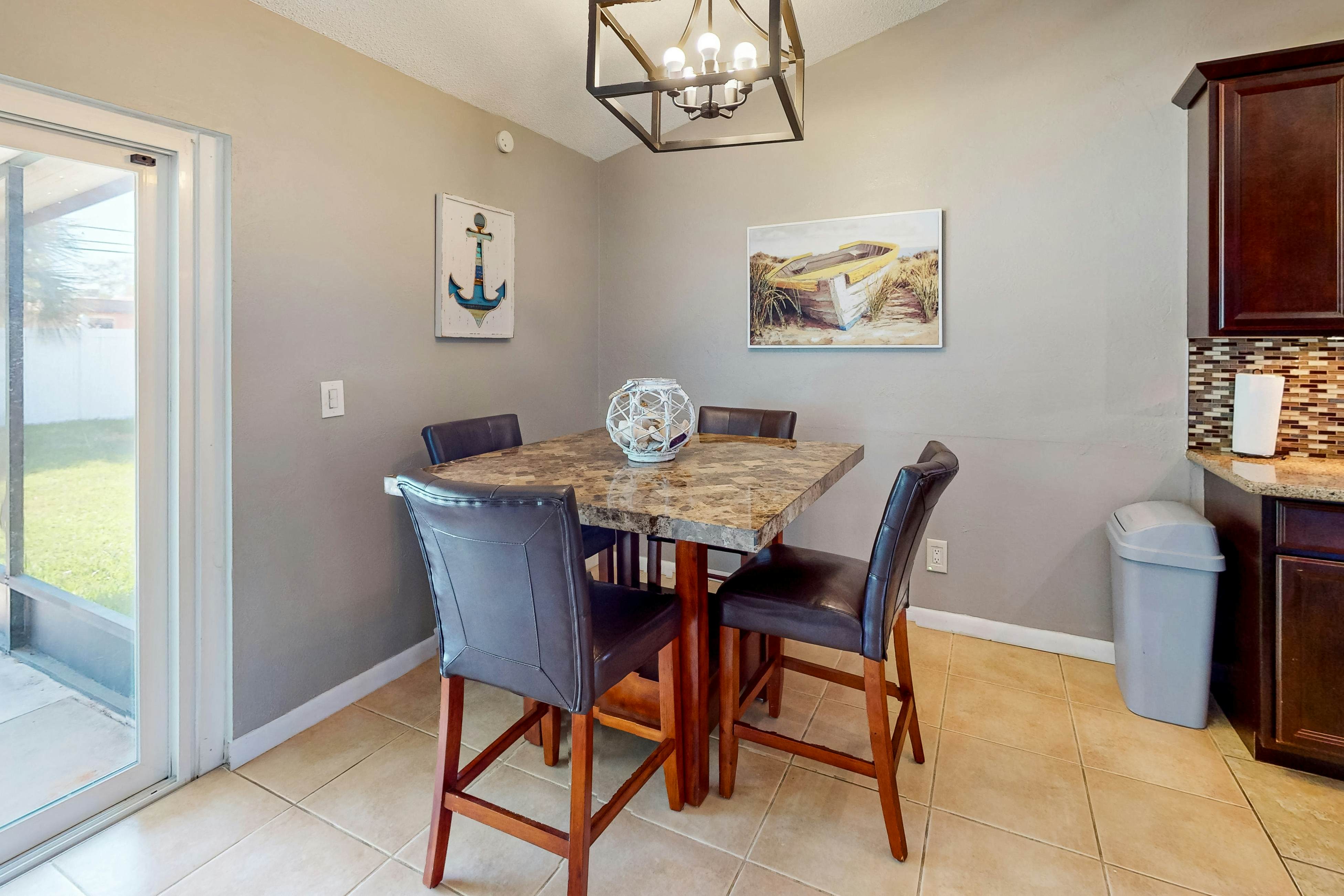 Dog-friendly house with patio, firepit, fenced yard, beach gear, & AC