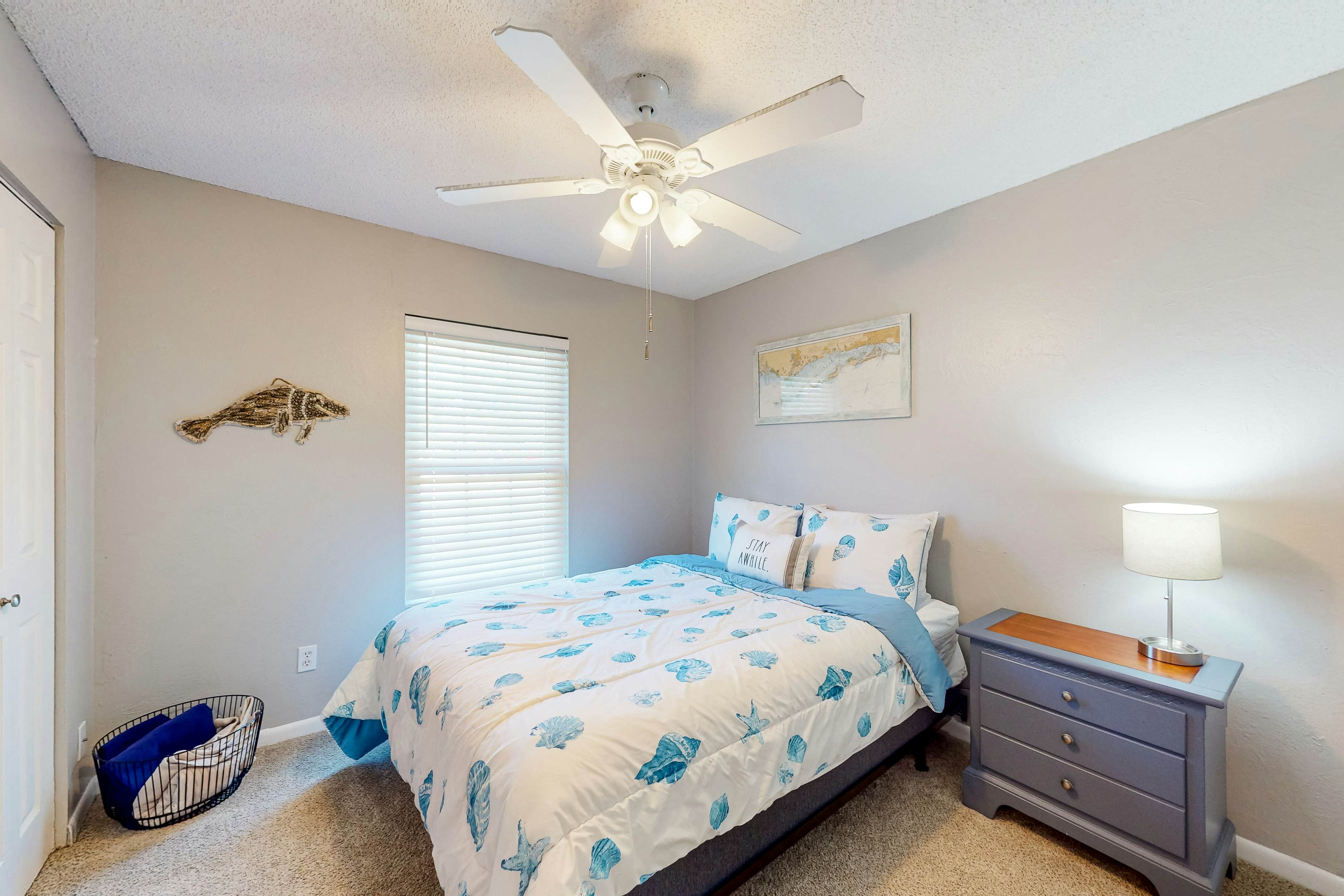 Dog-friendly house with patio, firepit, fenced yard, beach gear, & AC