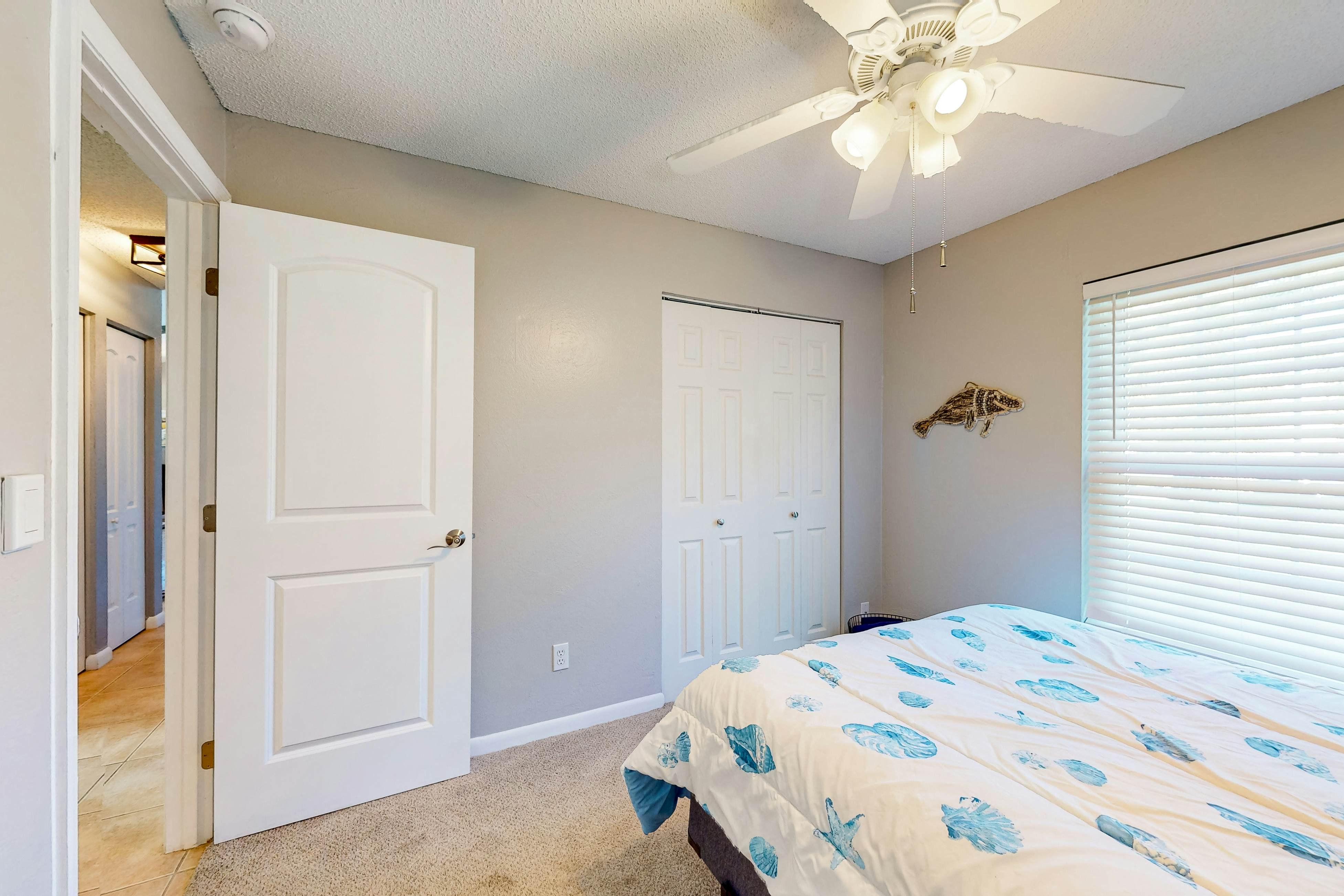 Dog-friendly house with patio, firepit, fenced yard, beach gear, & AC