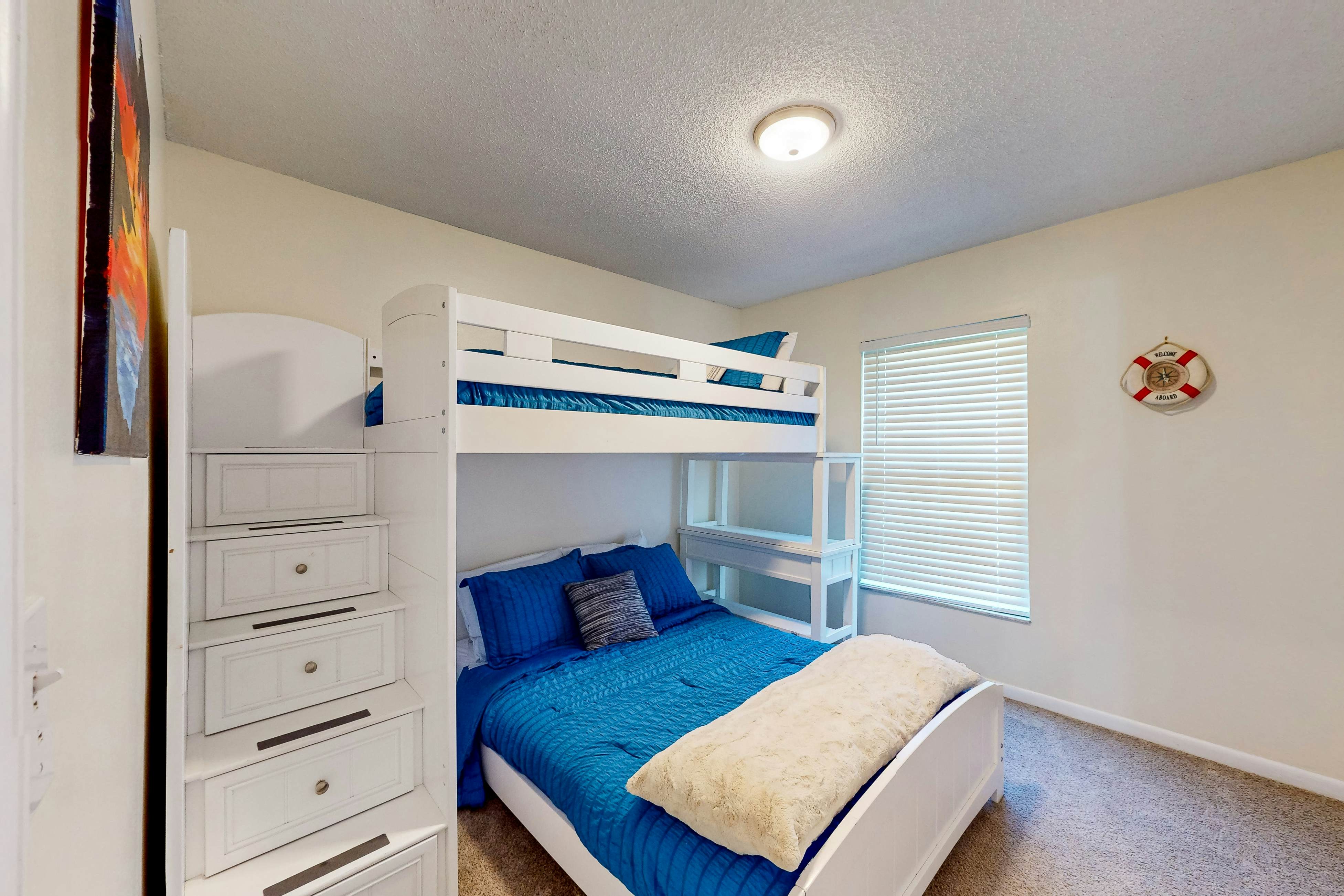 Dog-friendly house with patio, firepit, fenced yard, beach gear, & AC