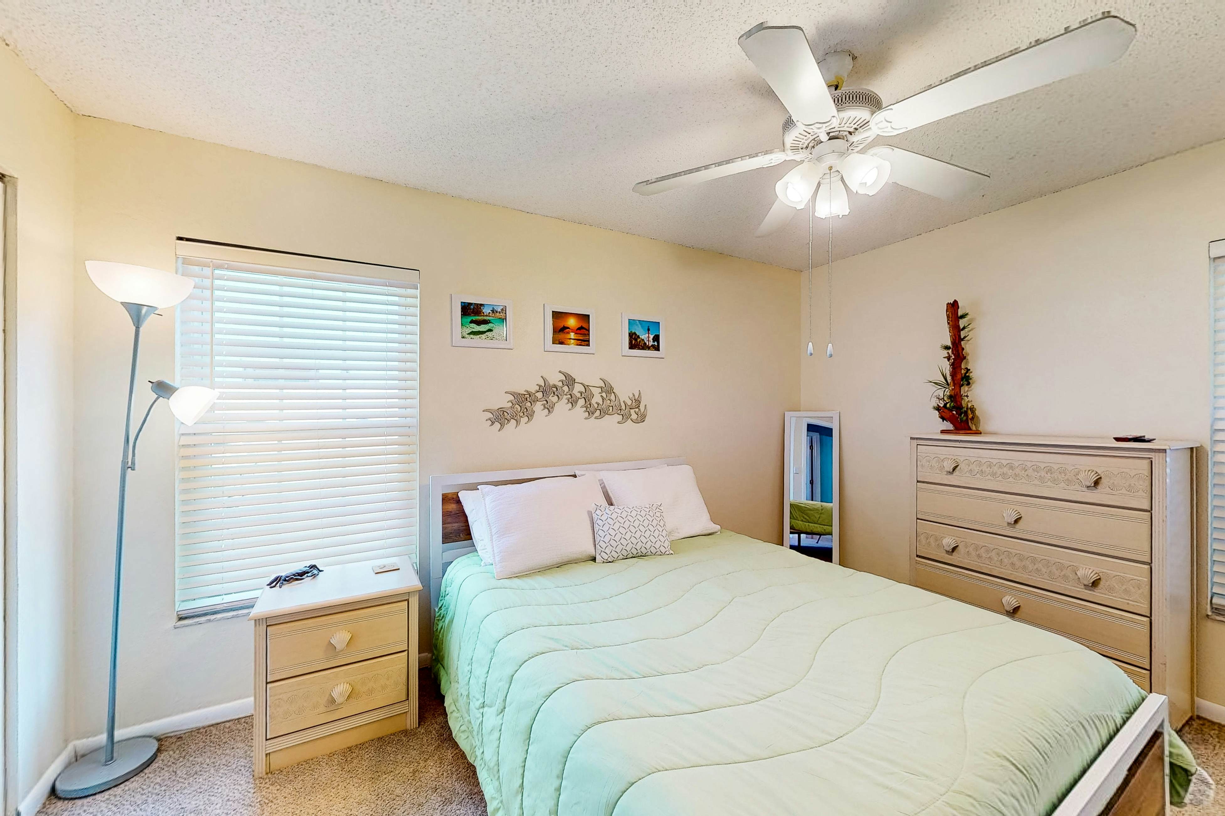 Dog-friendly house with patio, firepit, fenced yard, beach gear, & AC