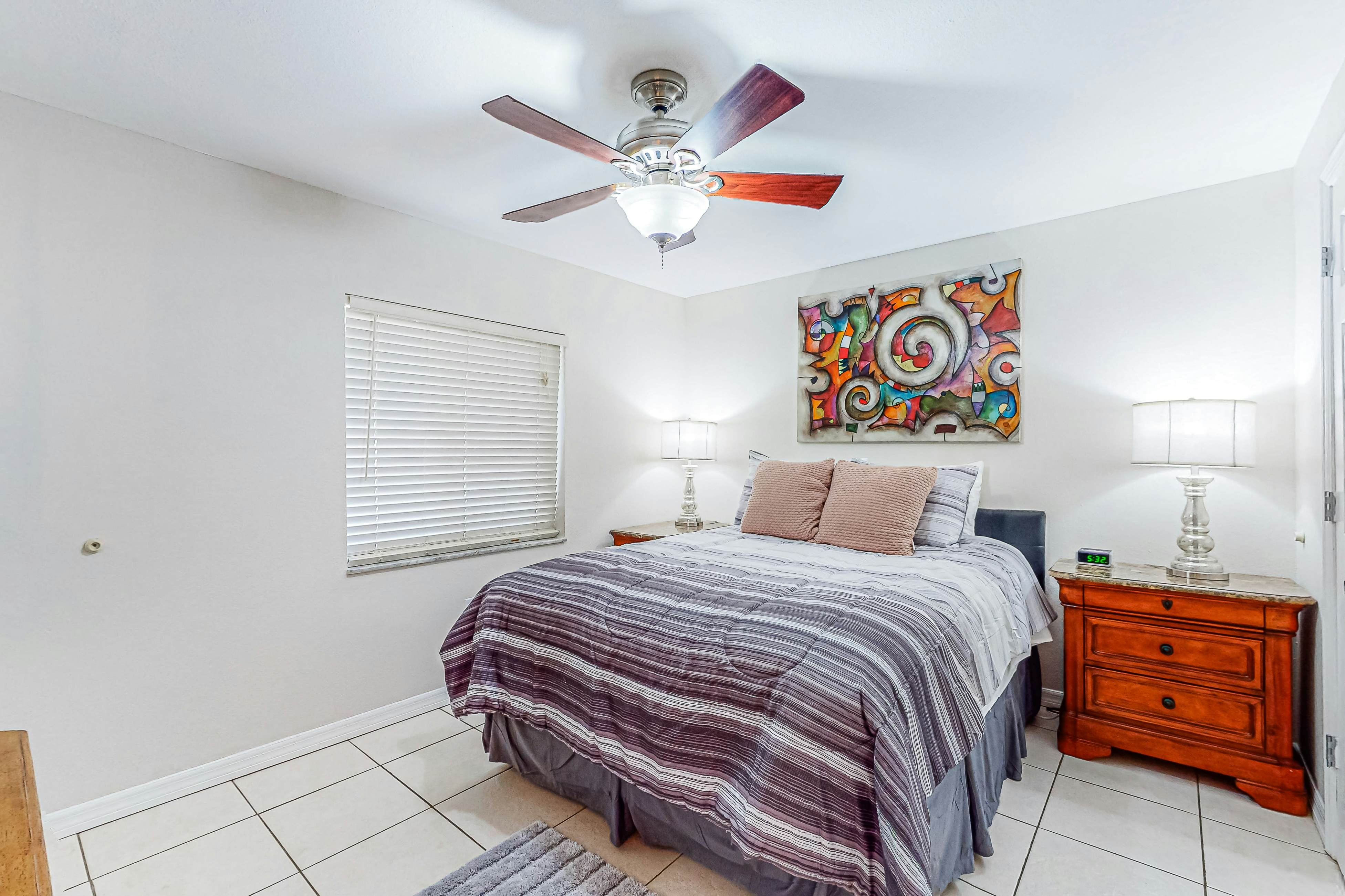 Centrally located condo with heated pool, balcony, washer/dryer & central AC