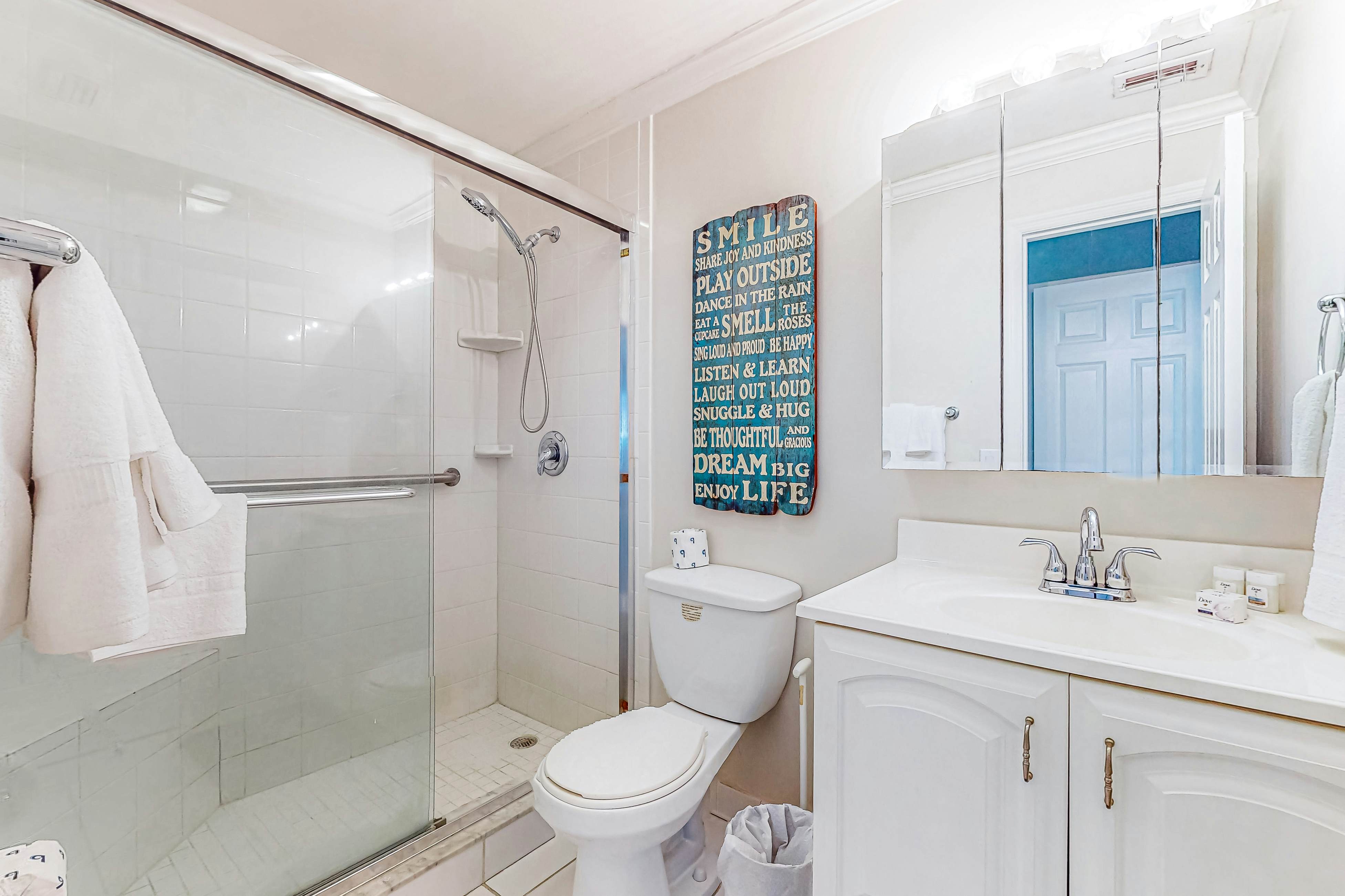 Centrally located condo with heated pool, balcony, washer/dryer & central AC