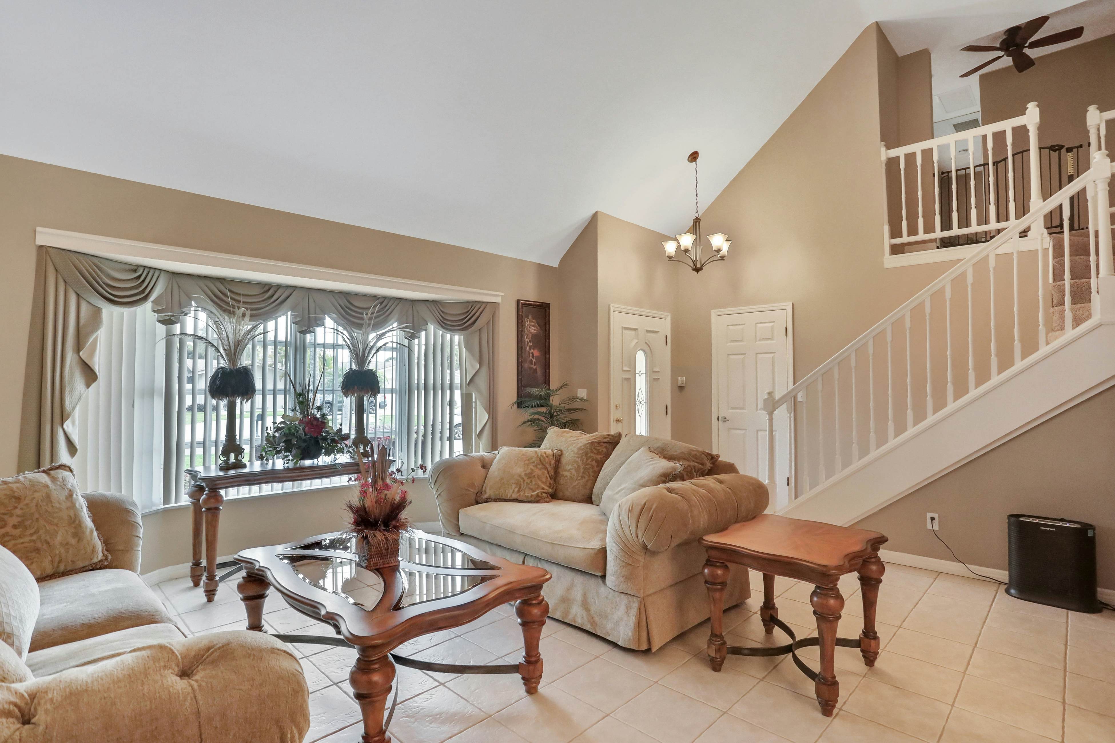 Snowbird-friendly elegant home with waterfront location, pool, grill, fireplace