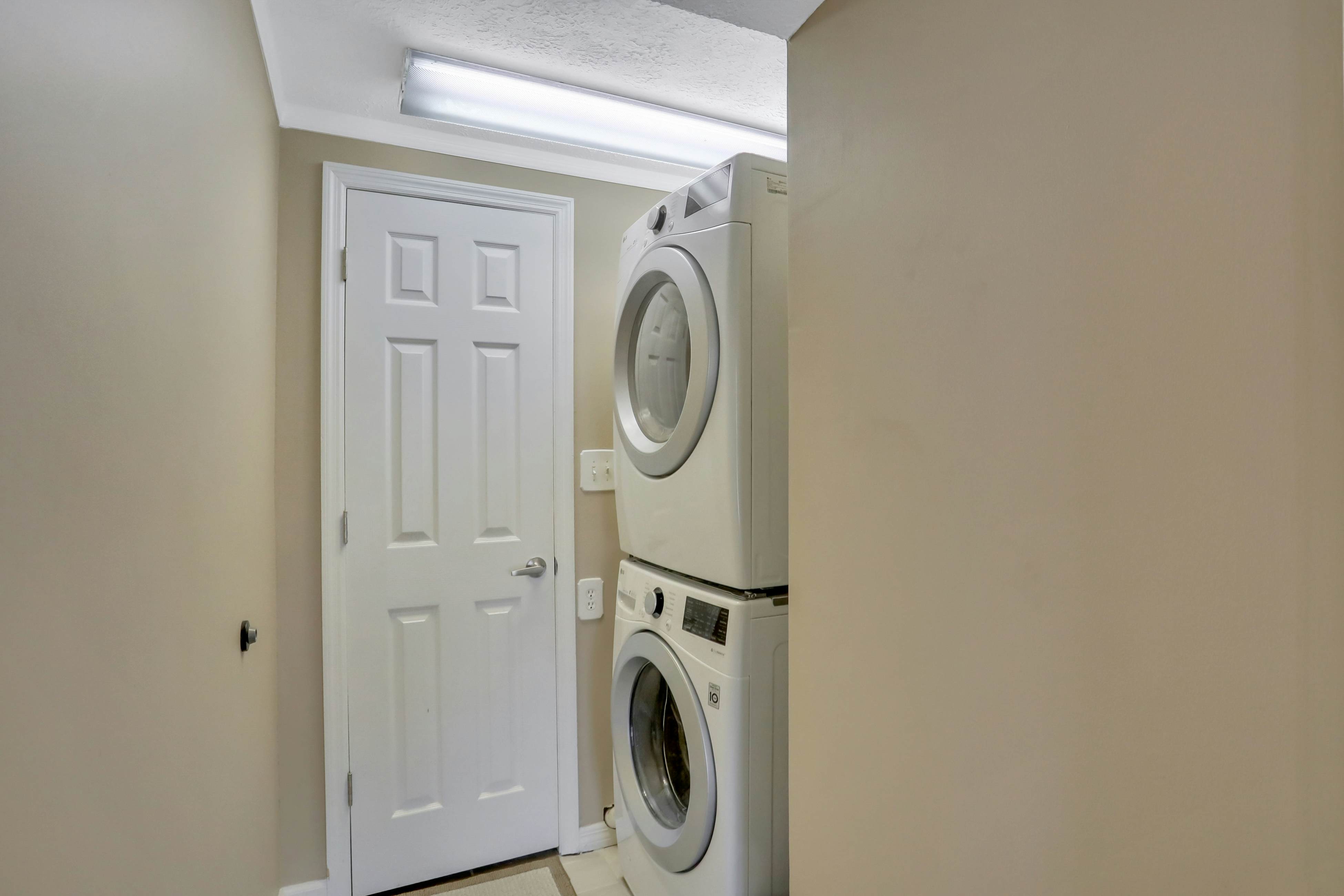 Snowbird-friendly elegant home with waterfront location, pool, grill, fireplace