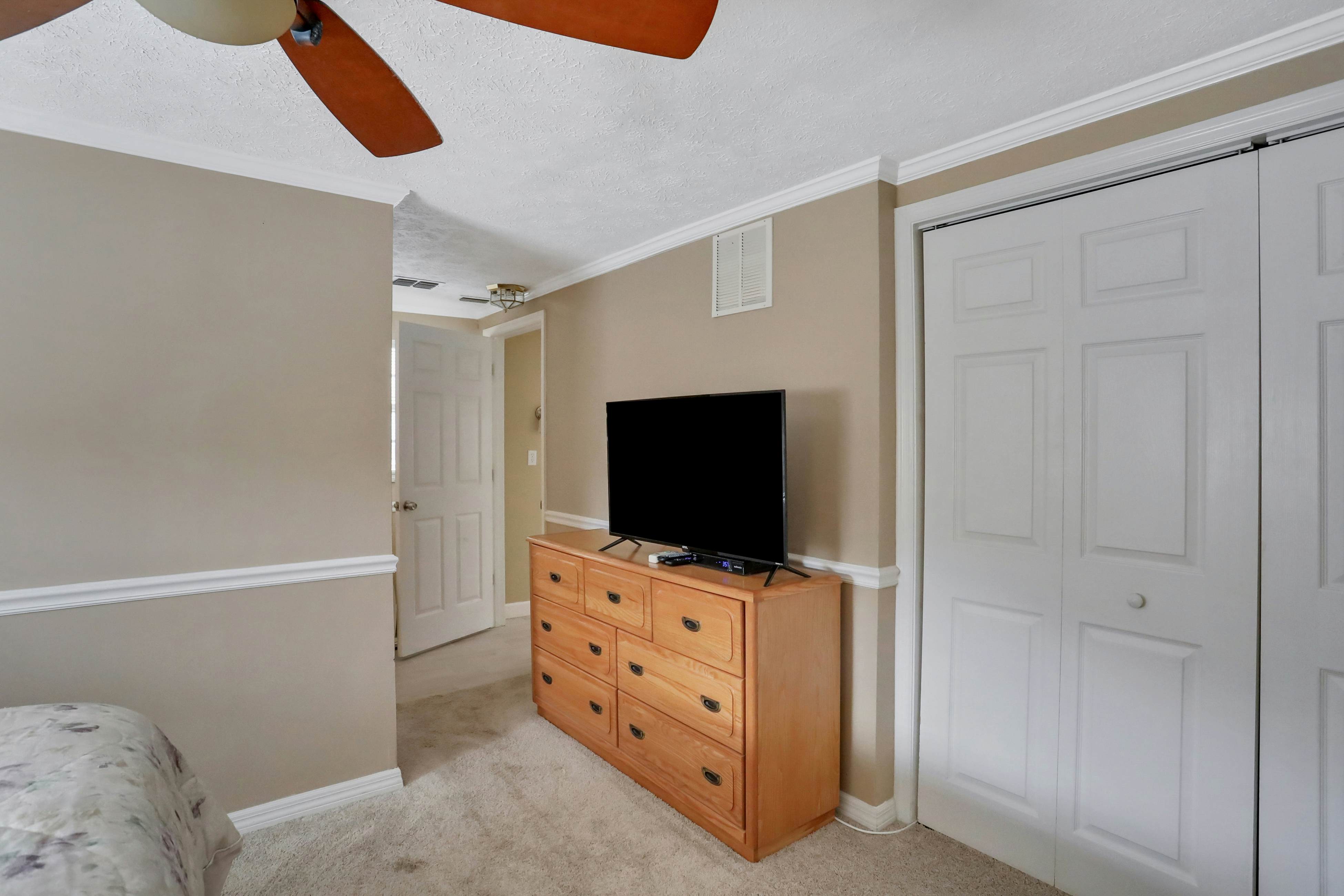 Snowbird-friendly elegant home with waterfront location, pool, grill, fireplace