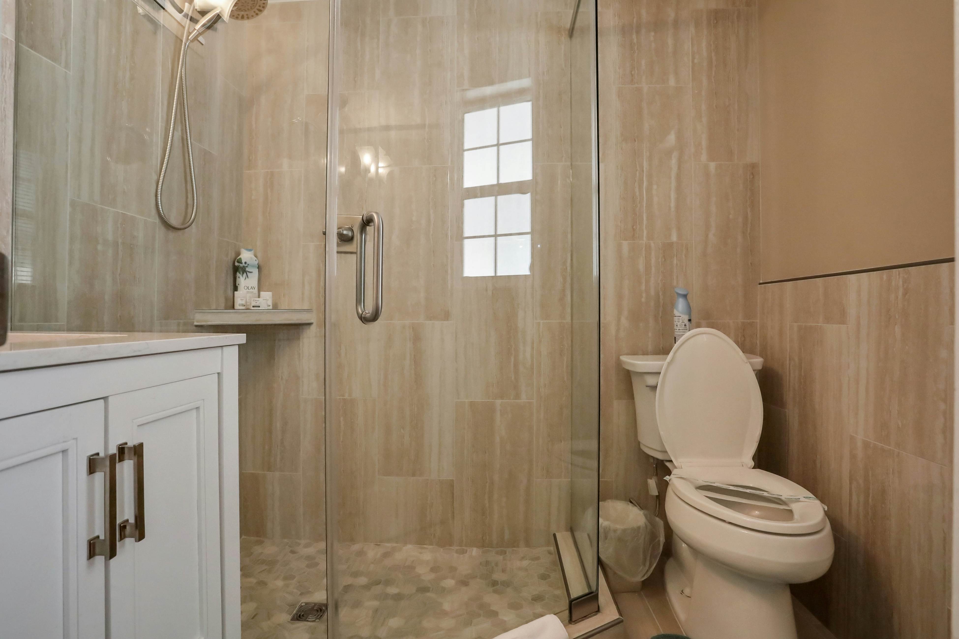 Snowbird-friendly elegant home with waterfront location, pool, grill, fireplace