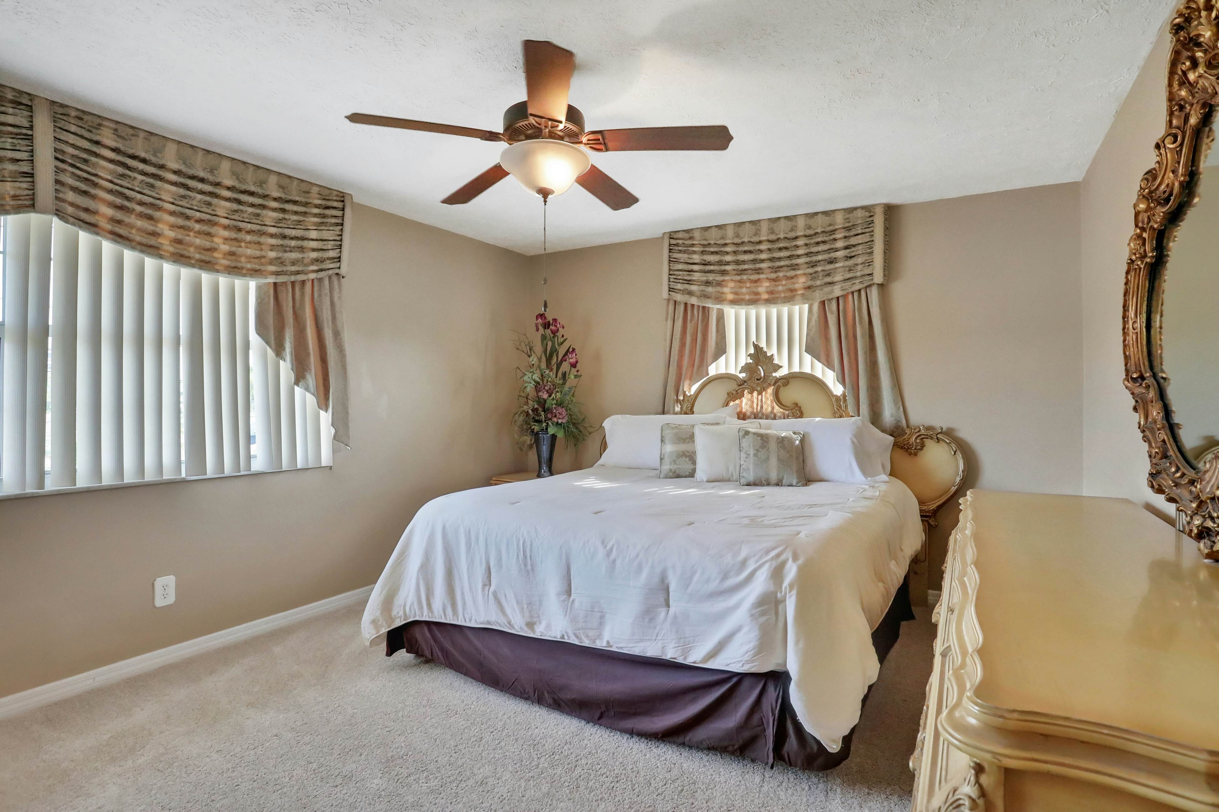 Snowbird-friendly elegant home with waterfront location, pool, grill, fireplace