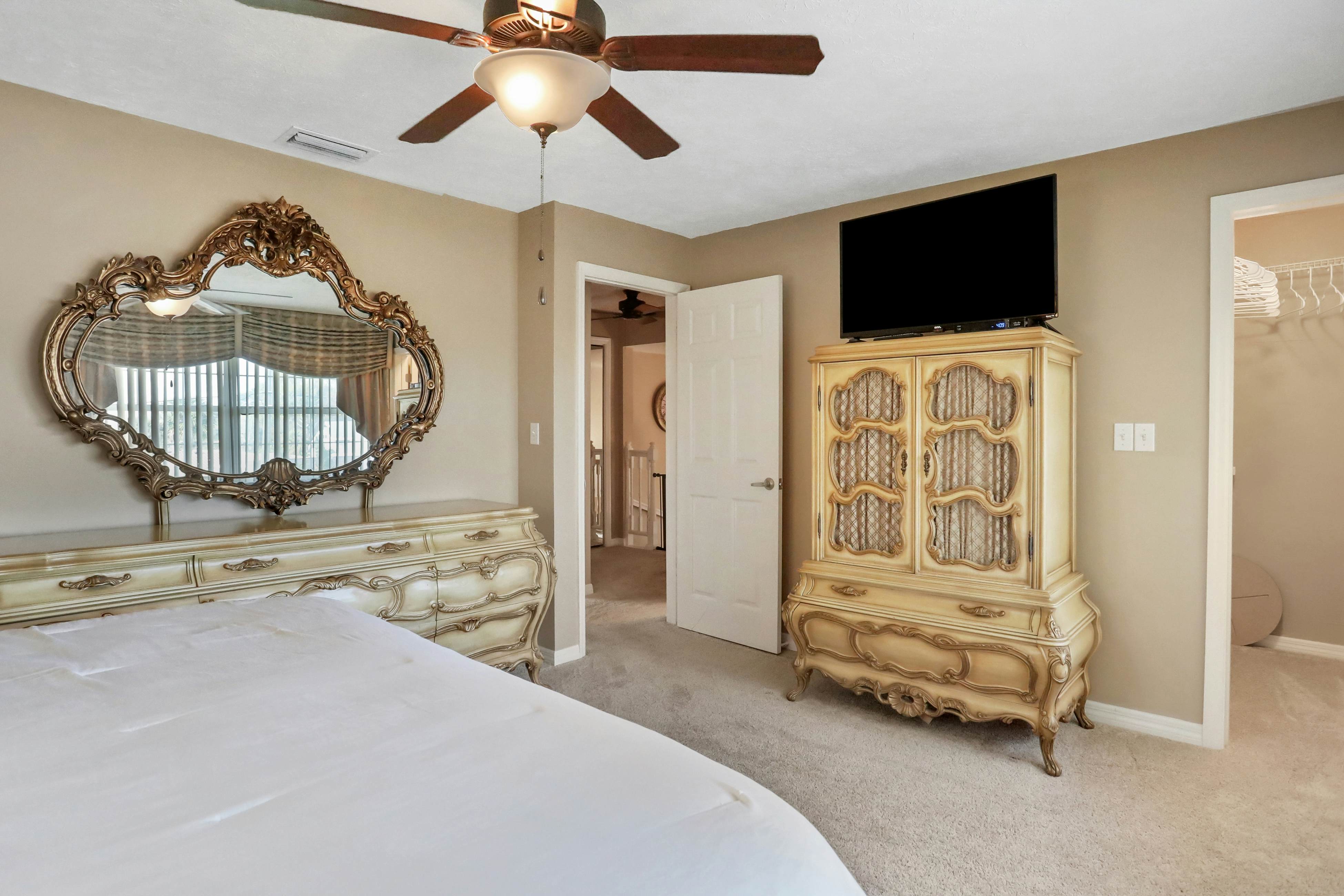 Snowbird-friendly elegant home with waterfront location, pool, grill, fireplace