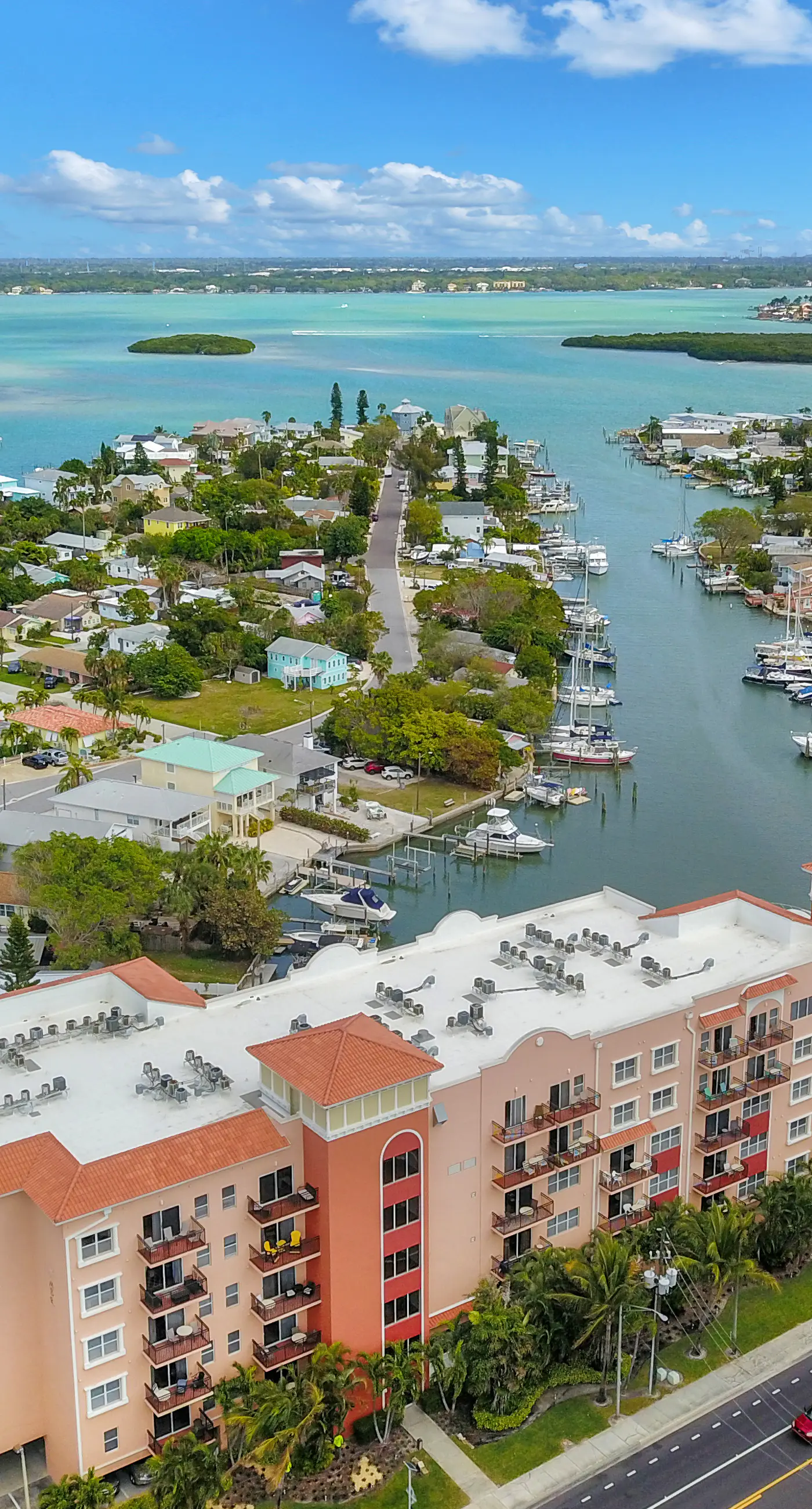 Bay front condo shared pool and hot tub right next to the beach