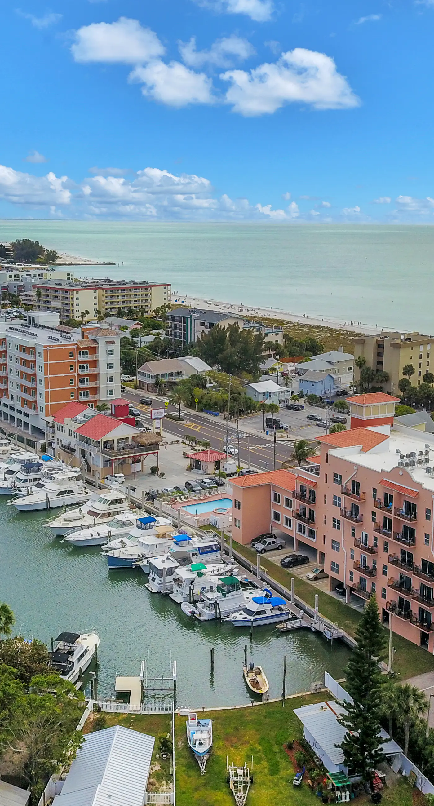 Bay front condo shared pool and hot tub right next to the beach