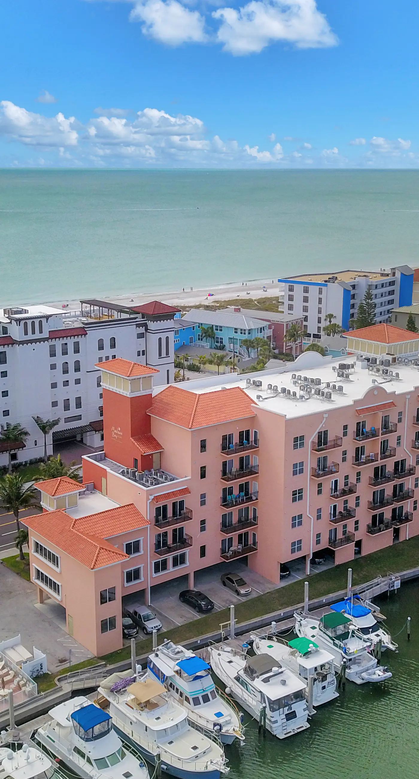 Bay front condo shared pool and hot tub right next to the beach