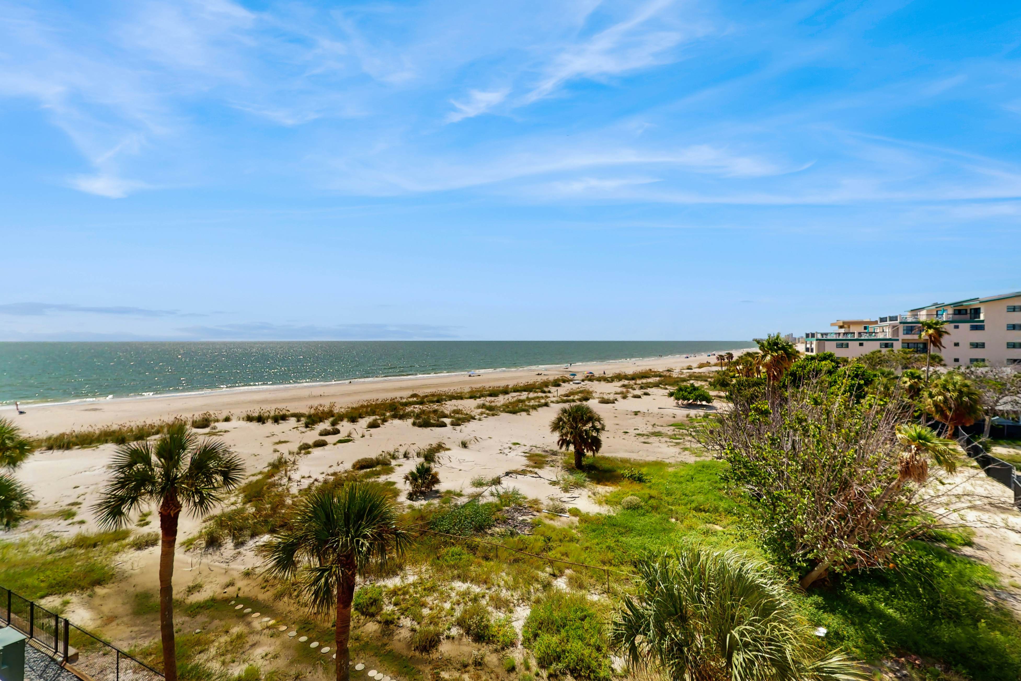 Gulf-front getaway with sunset-view balcony, beachfront pool & easy beach access