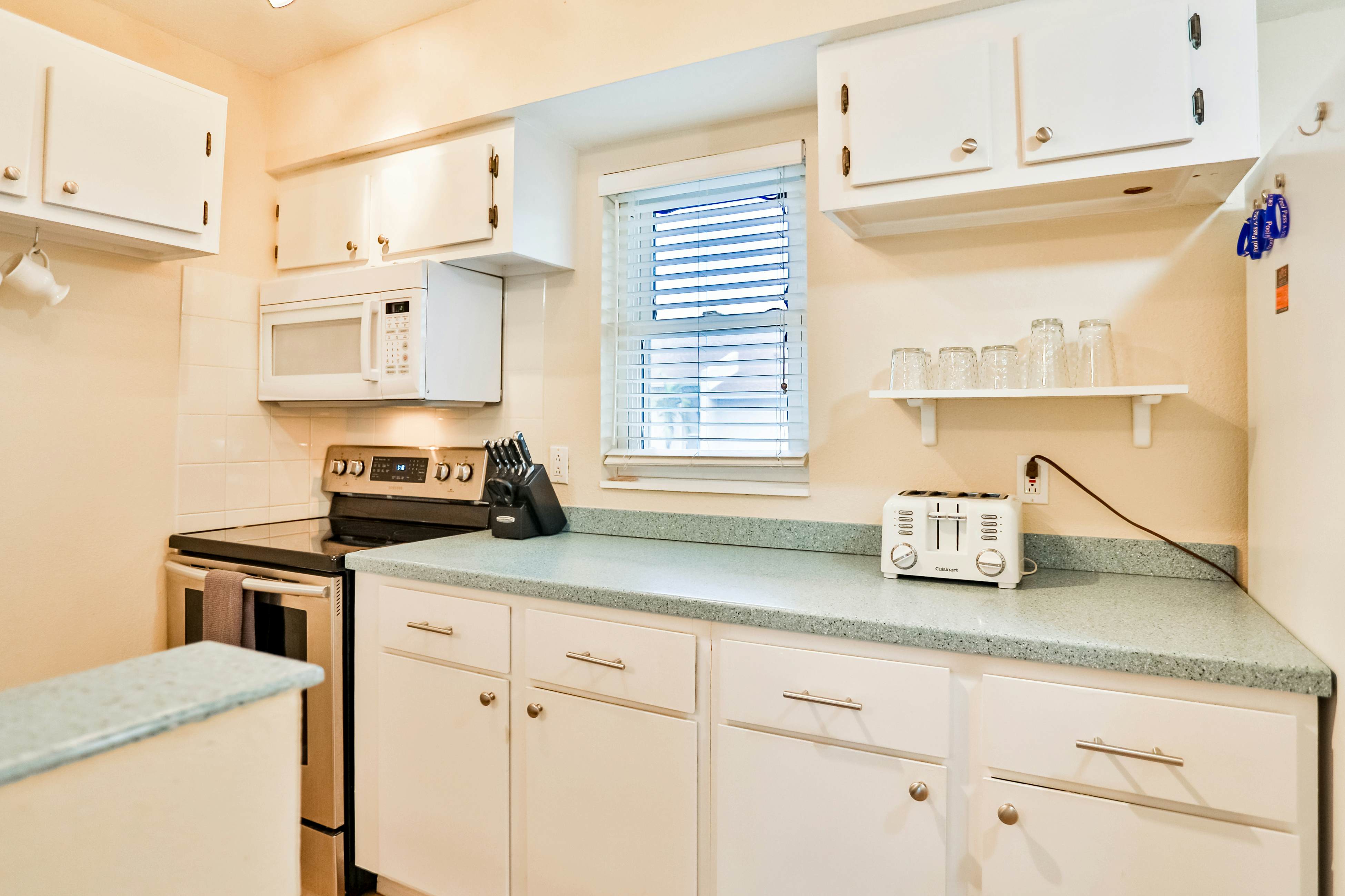 Snowbird-friendly, waterfront condo with WiFi, central AC, washer/dryer, & pool