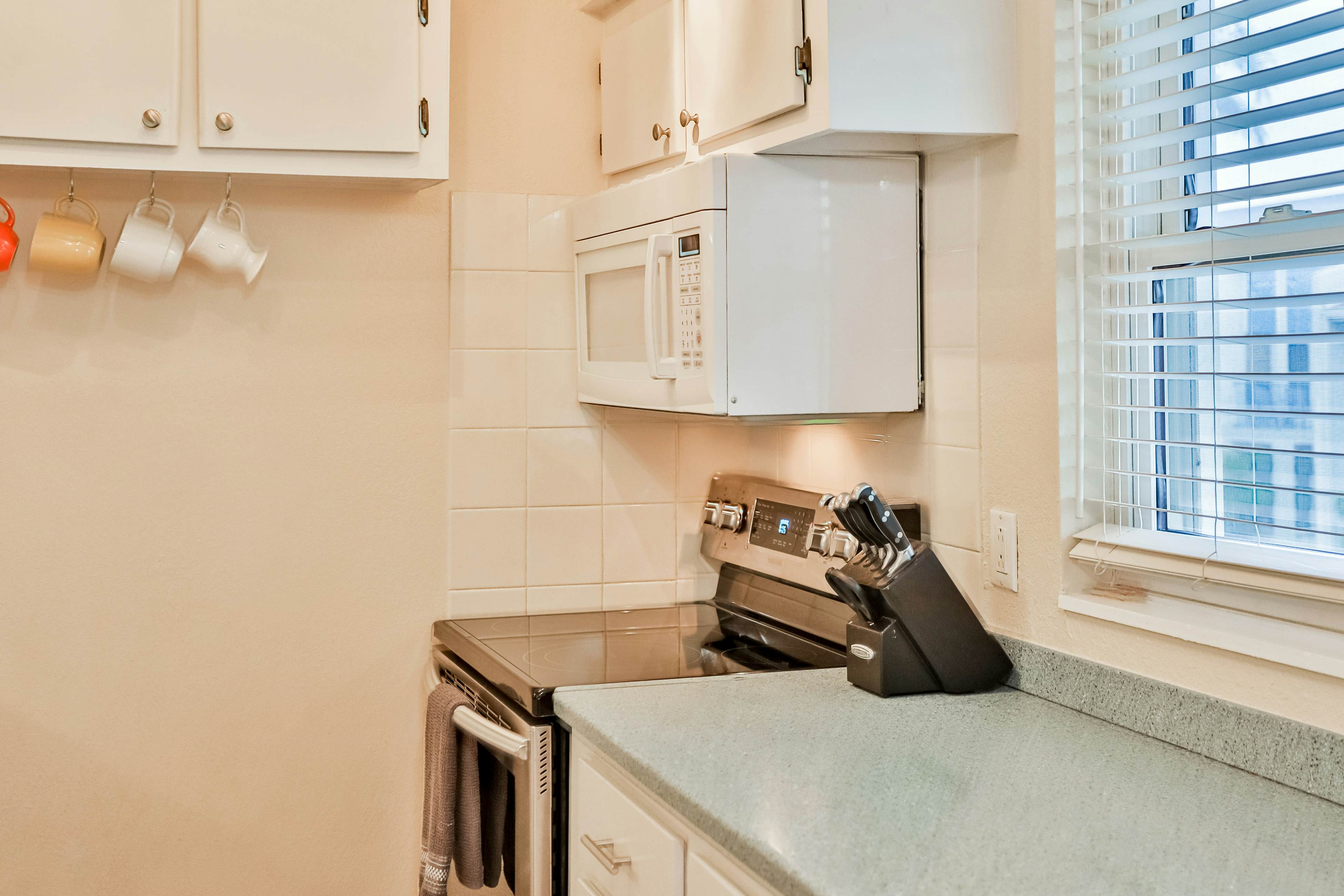 Snowbird-friendly, waterfront condo with WiFi, central AC, washer/dryer, & pool