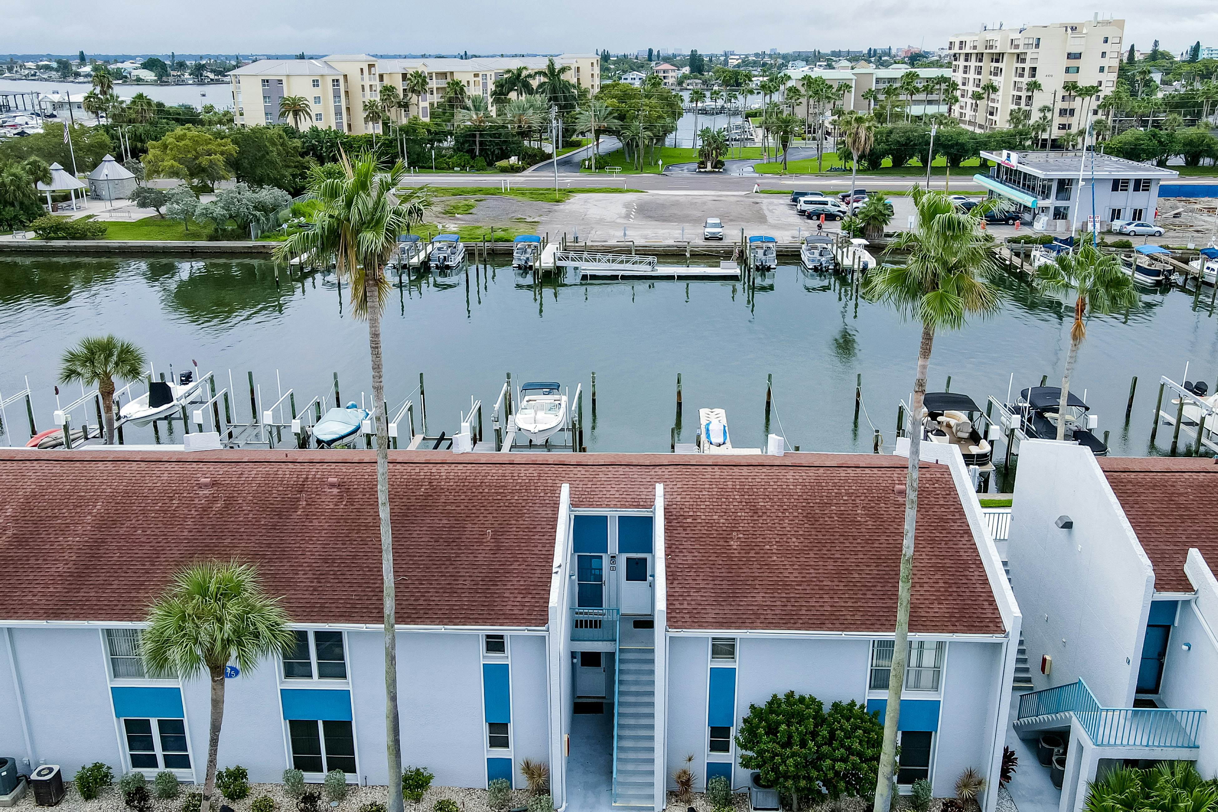 Snowbird-friendly, waterfront condo with WiFi, central AC, washer/dryer, & pool