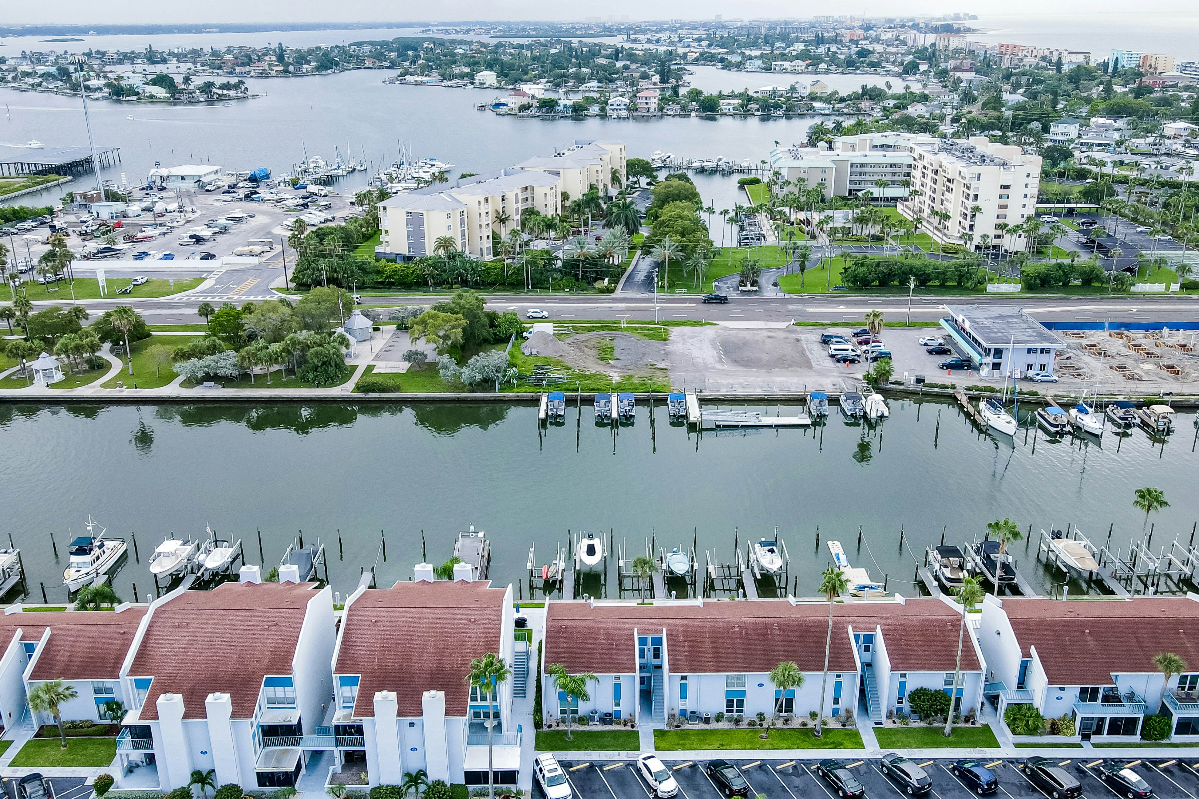 Snowbird-friendly, waterfront condo with WiFi, central AC, washer/dryer, & pool