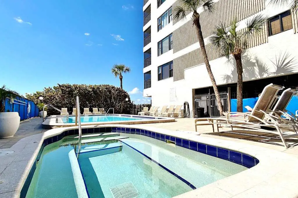 Extraordinary Gulf front condo w screened in balcony WD AC heated pool pool spa