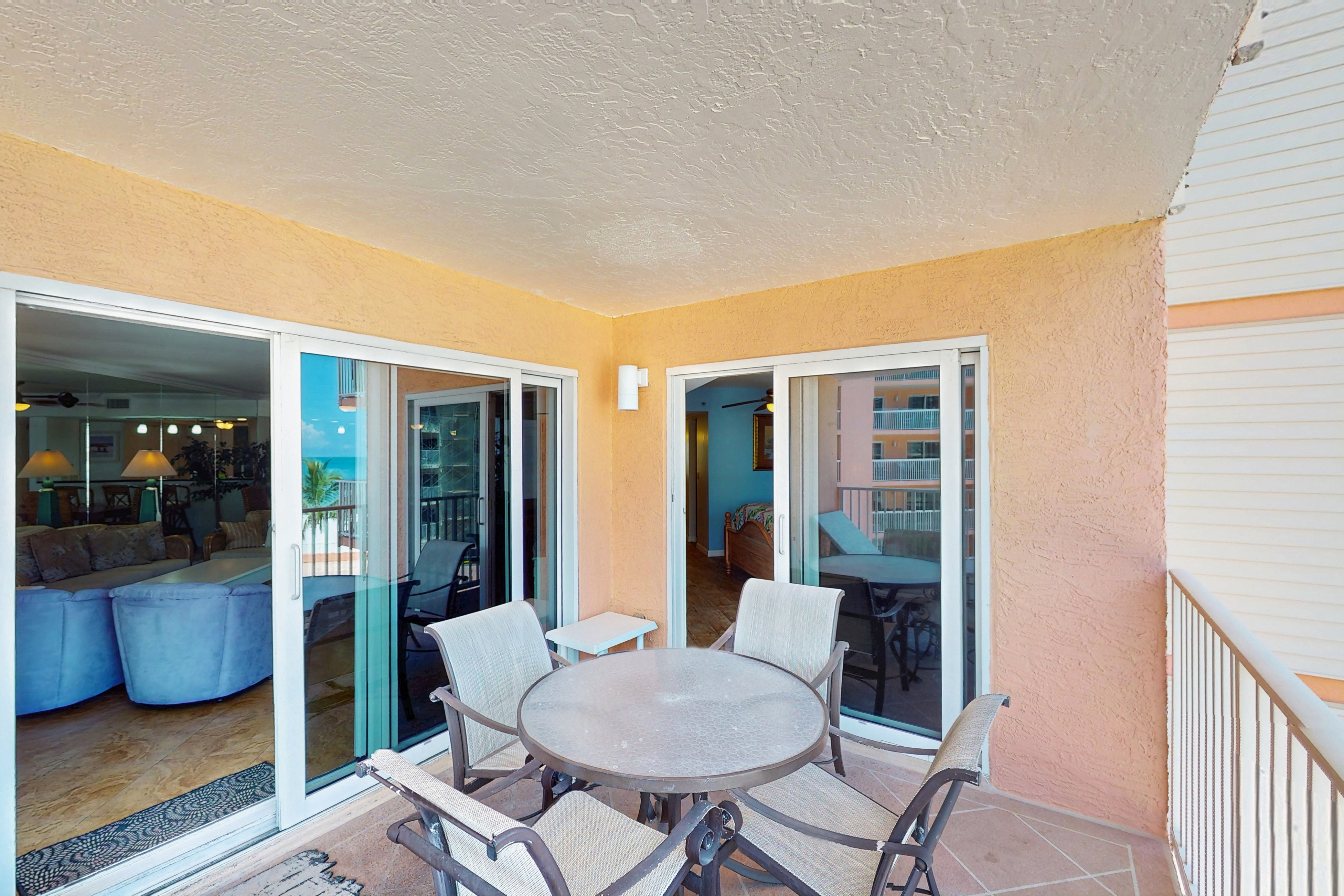 Beachfront condo with balcony pool hot tub grill and AC