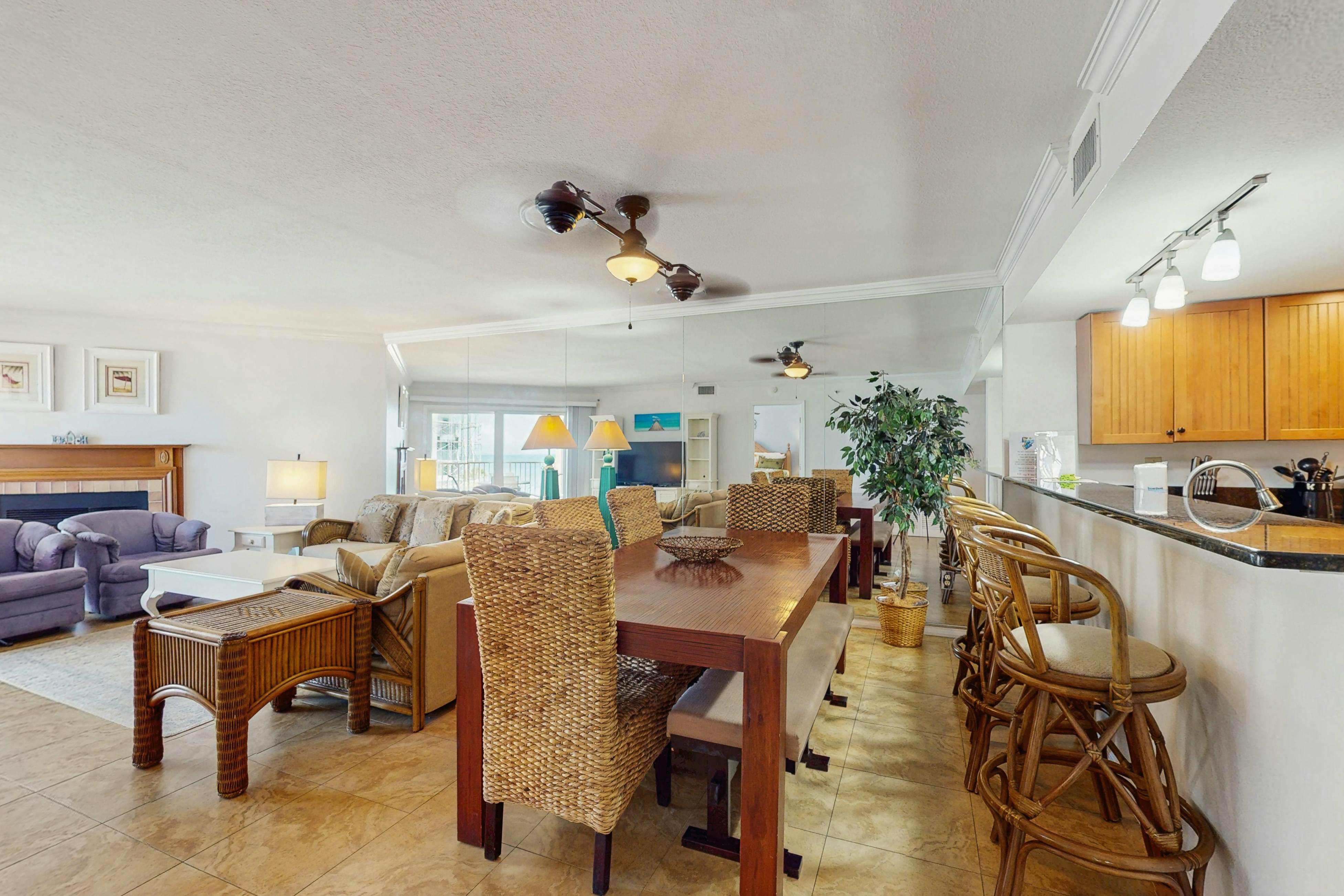 Beachfront condo with balcony, pool, hot tub, grill, & AC