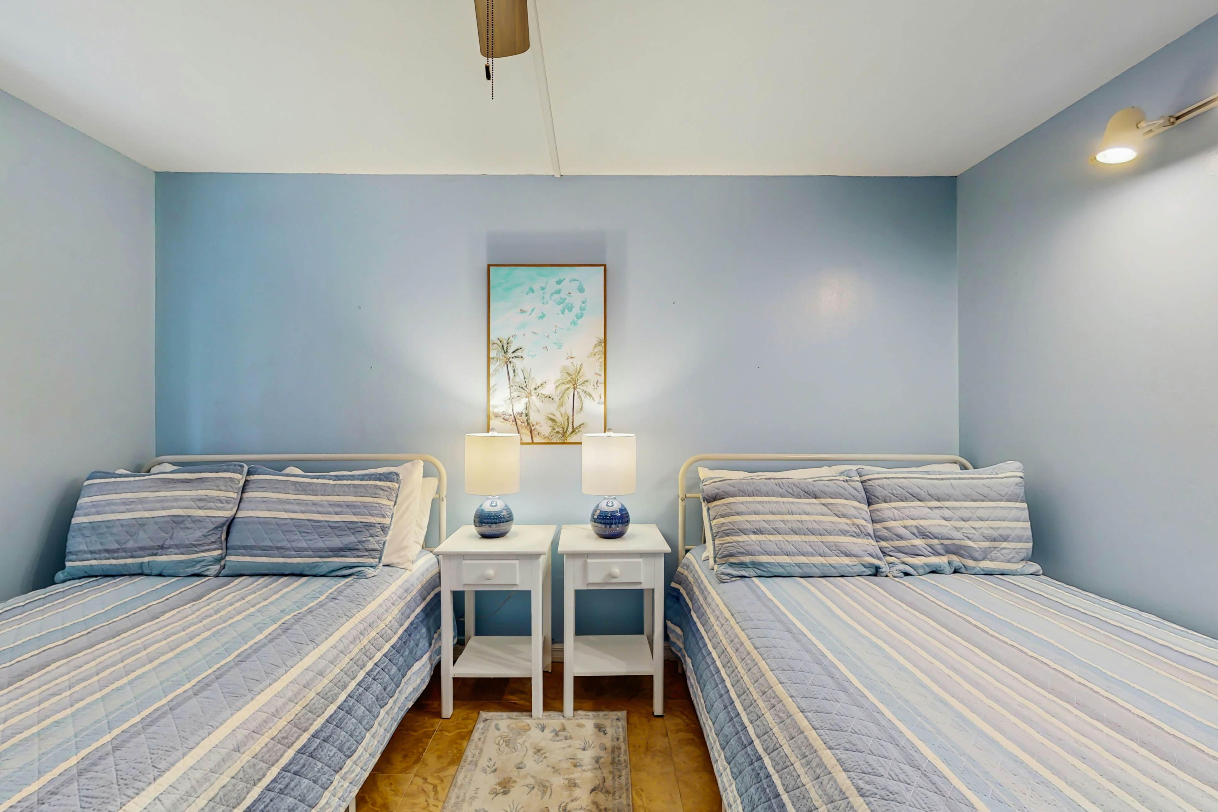 Beachfront condo with balcony, pool, hot tub, grill, & AC