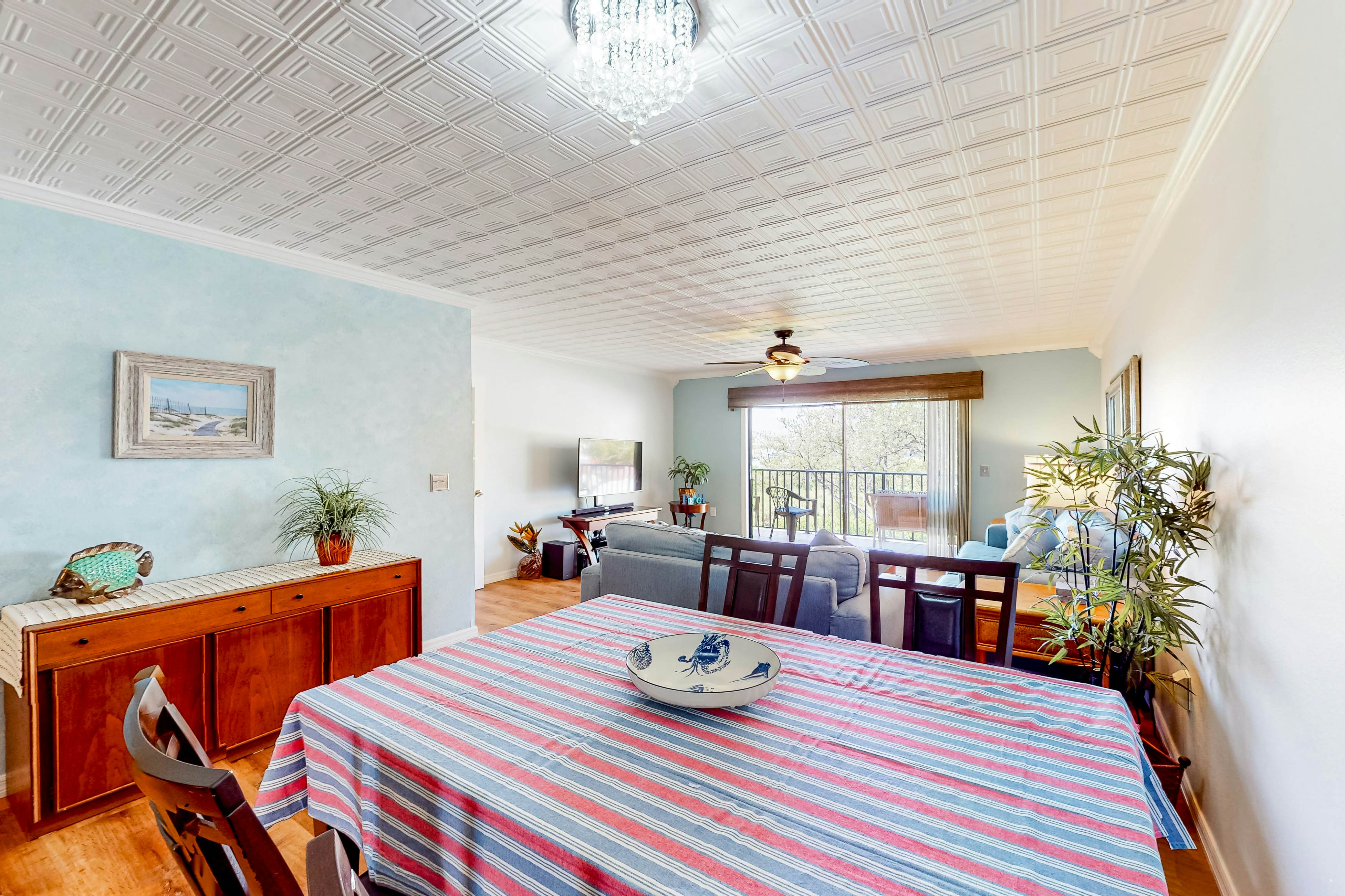 Beachfront condo with balconies, grill, AC, & pool access - steps from the sand