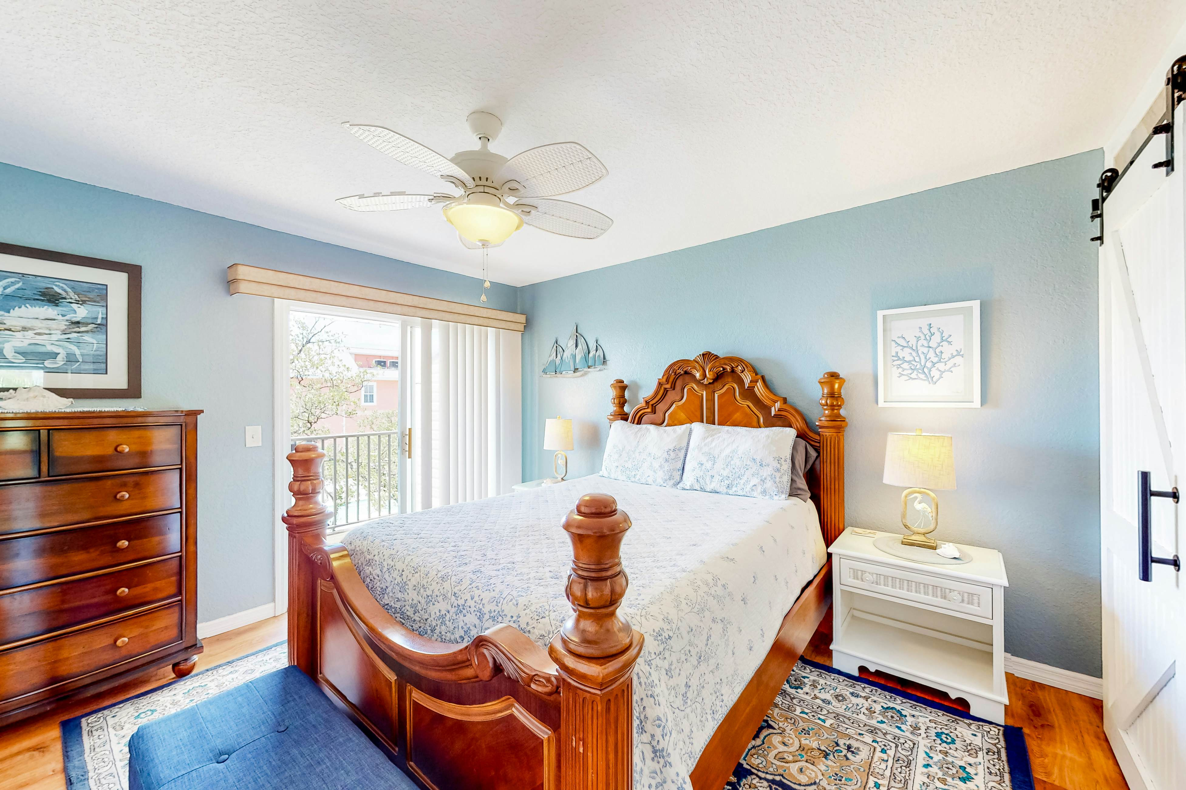 Beachfront condo with balconies, grill, AC, & pool access - steps from the sand