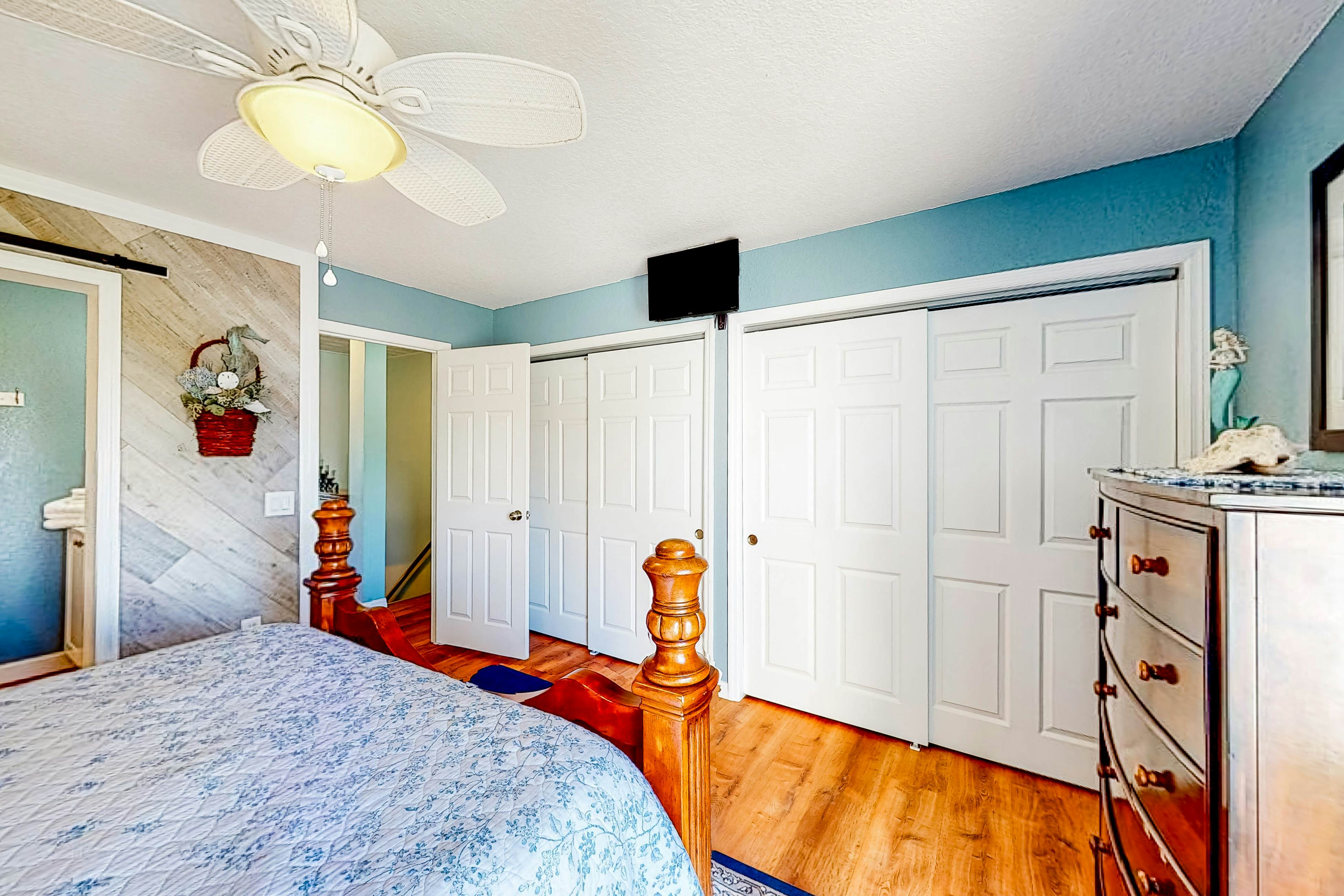 Beachfront condo with balconies, grill, AC, & pool access - steps from the sand