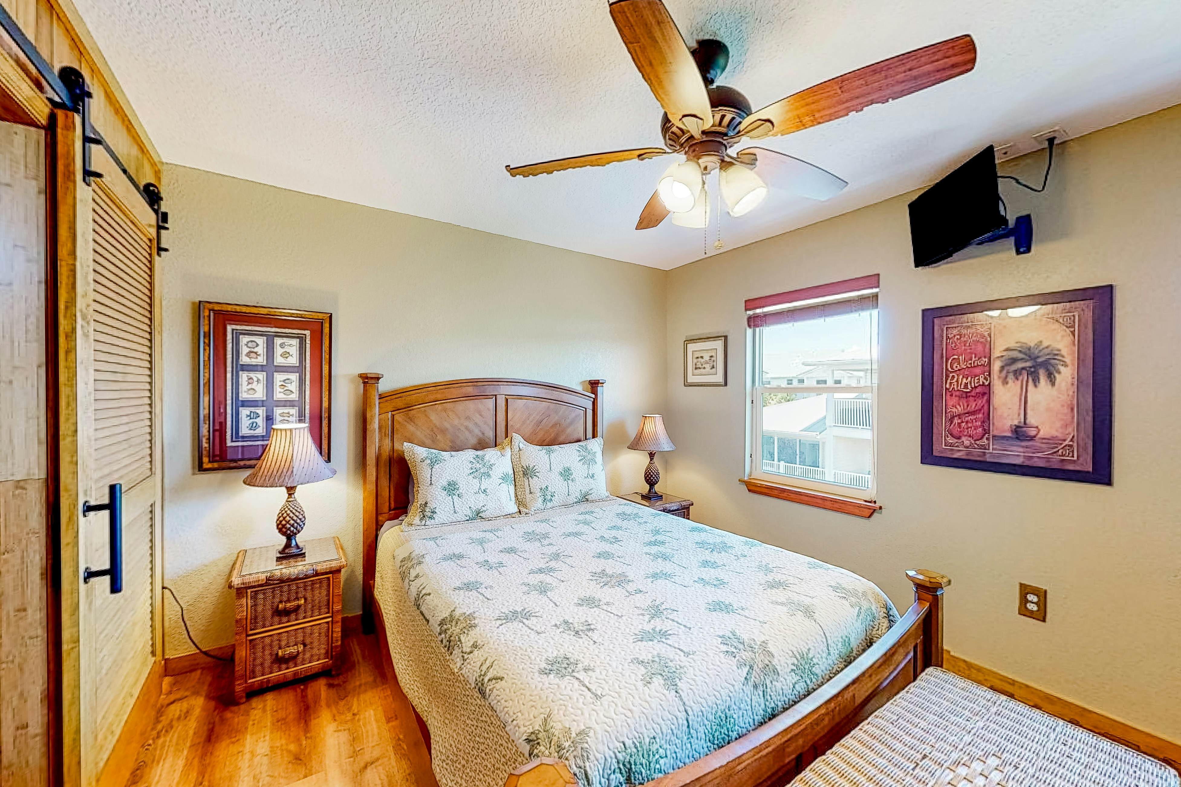 Beachfront condo with balconies, grill, AC, & pool access - steps from the sand