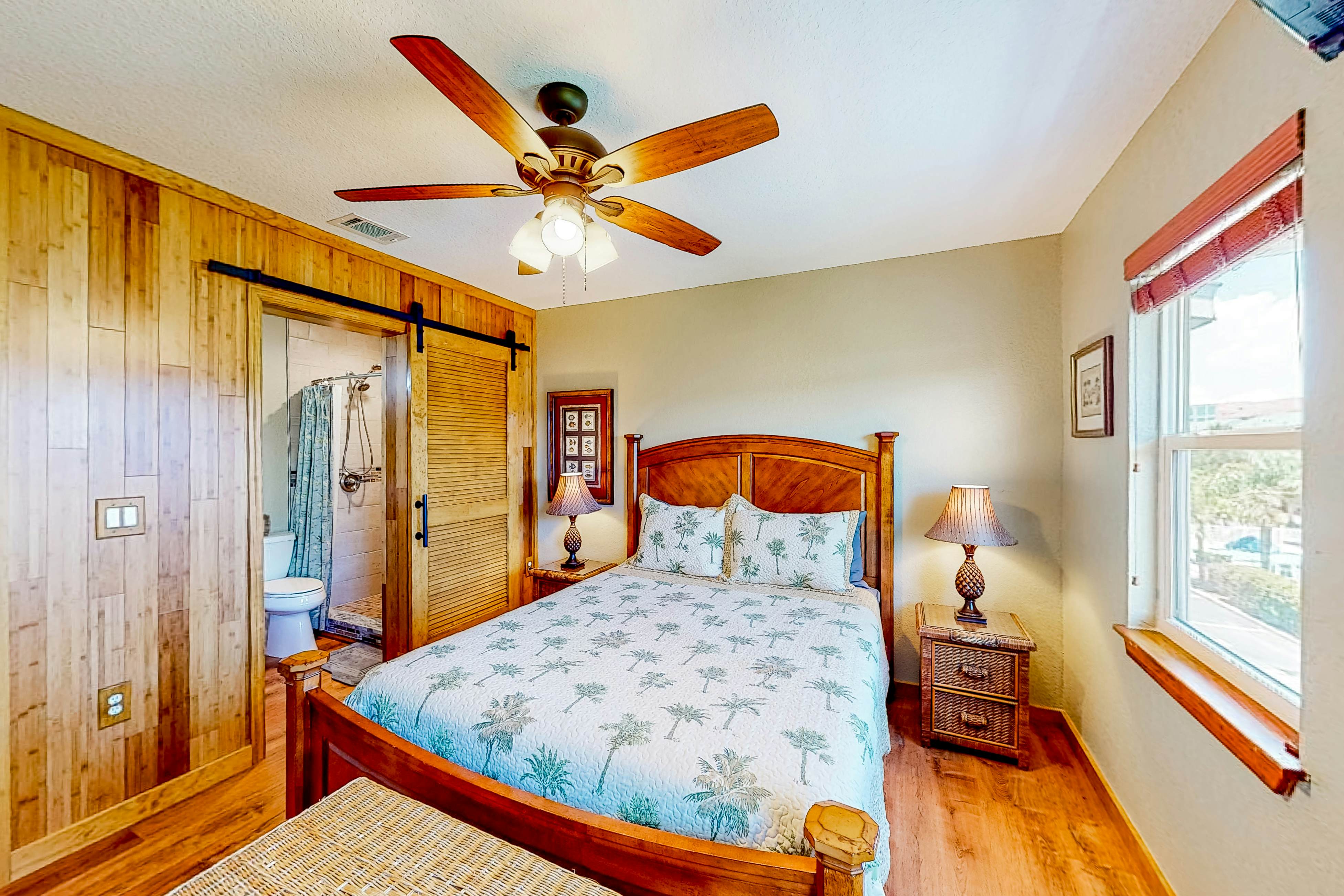 Beachfront condo with balconies, grill, AC, & pool access - steps from the sand