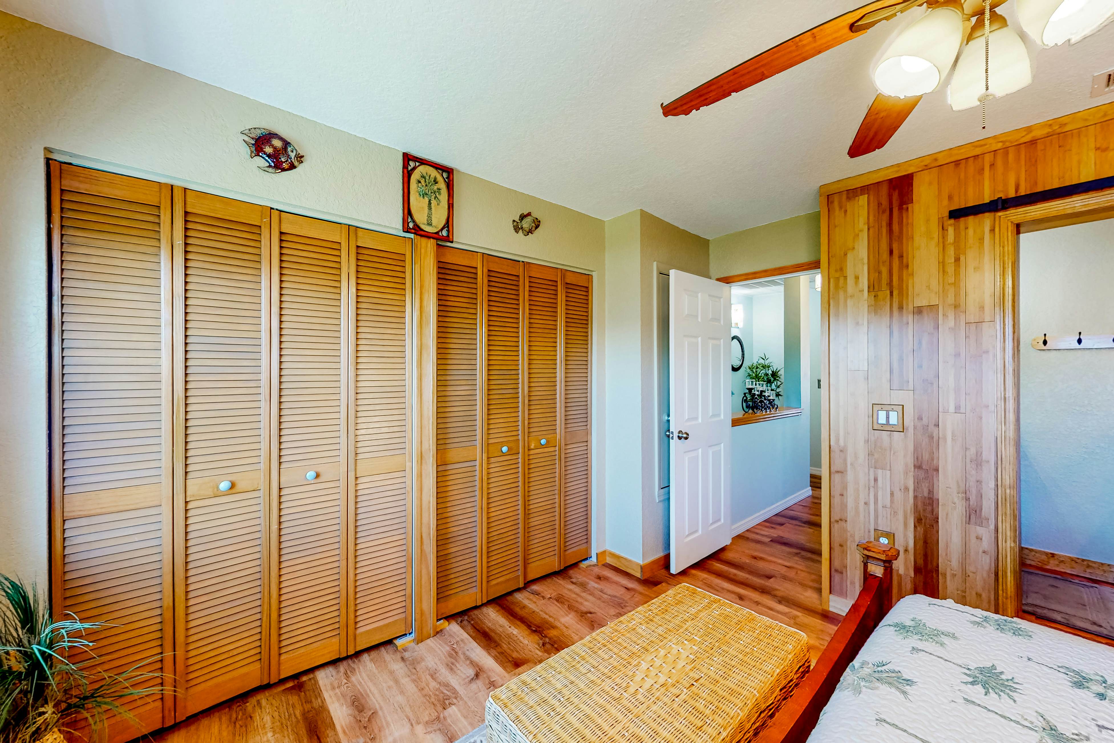 Beachfront condo with balconies, grill, AC, & pool access - steps from the sand